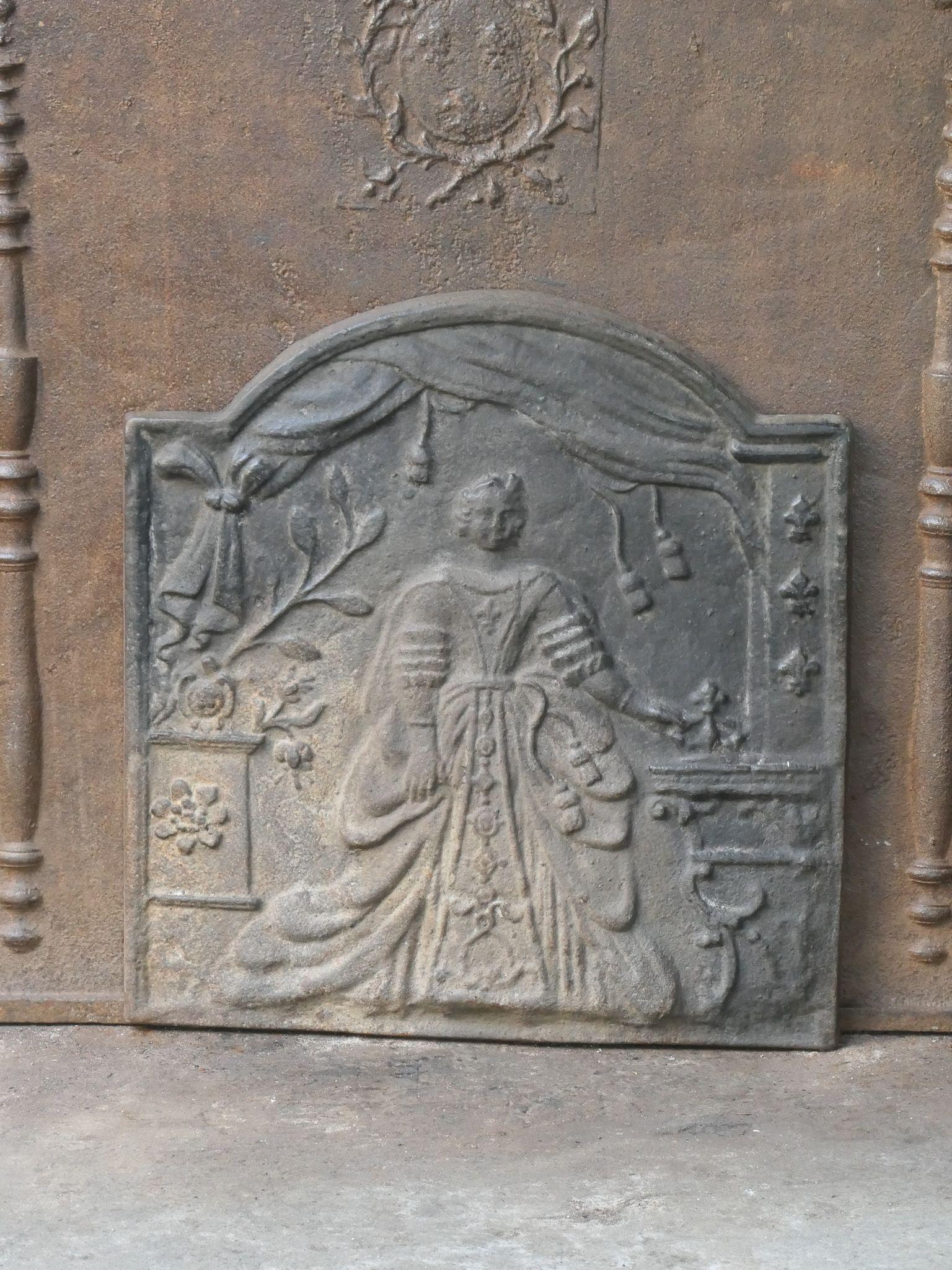 20th century fireback with Marie Leszczynska, queen of France and wife of king Louis XV. 

The fireback is made of cast iron and has a natural brown patina. Upon request, it can be made black/pewter. The condition is good, with no cracks. 