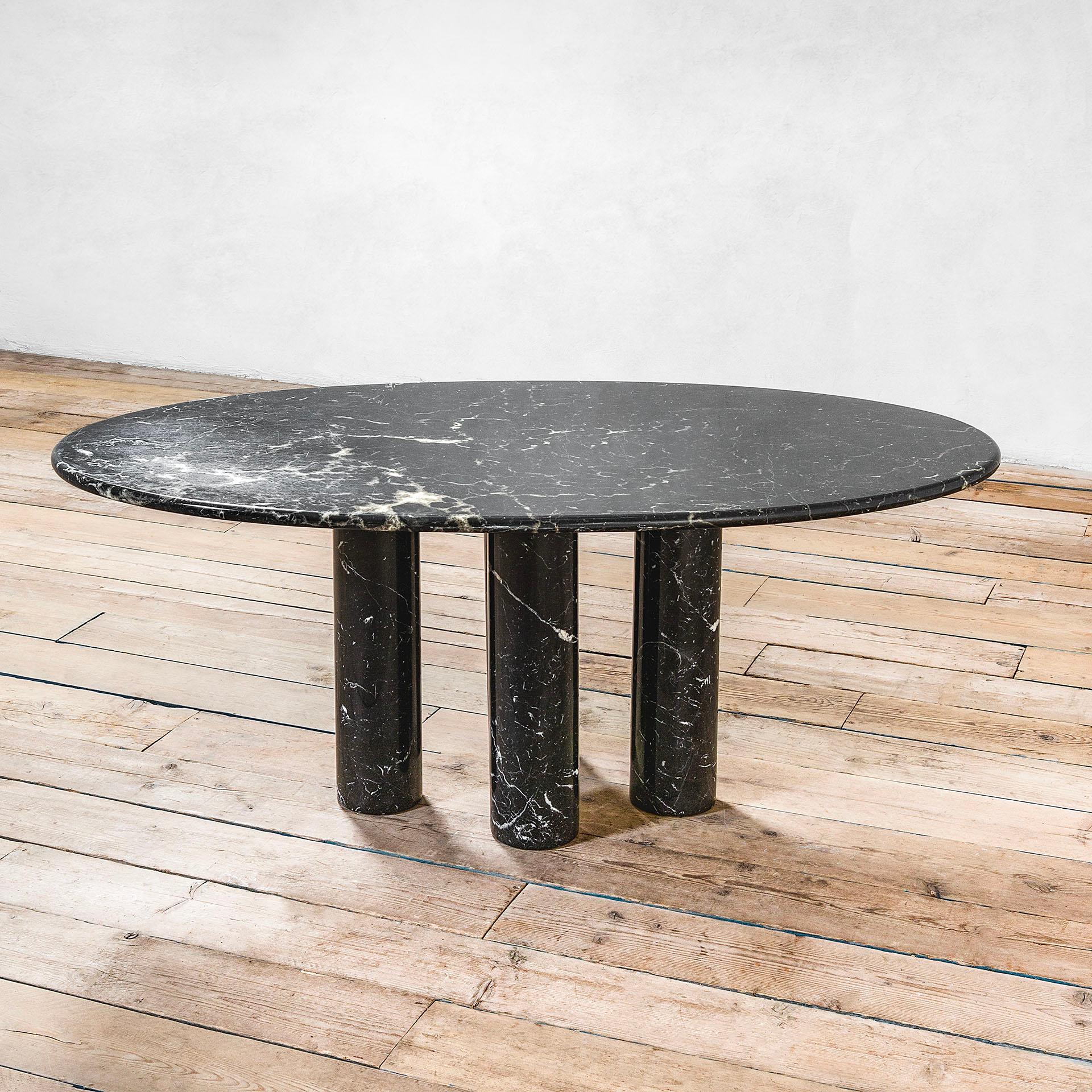 black marble oval table