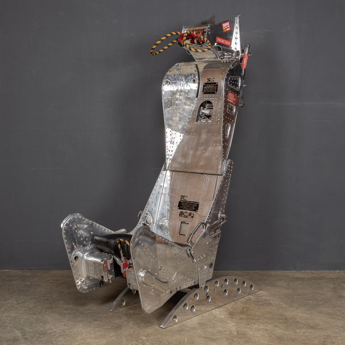 A fantastic 6MSA ejection seat made by Martin Baker, used in the Blackburn Buccaneer S2.

This superbly detailed, highly polished ejection seat with bespoke leather seat is now a fully functional chair, with a fully working electric raising seat