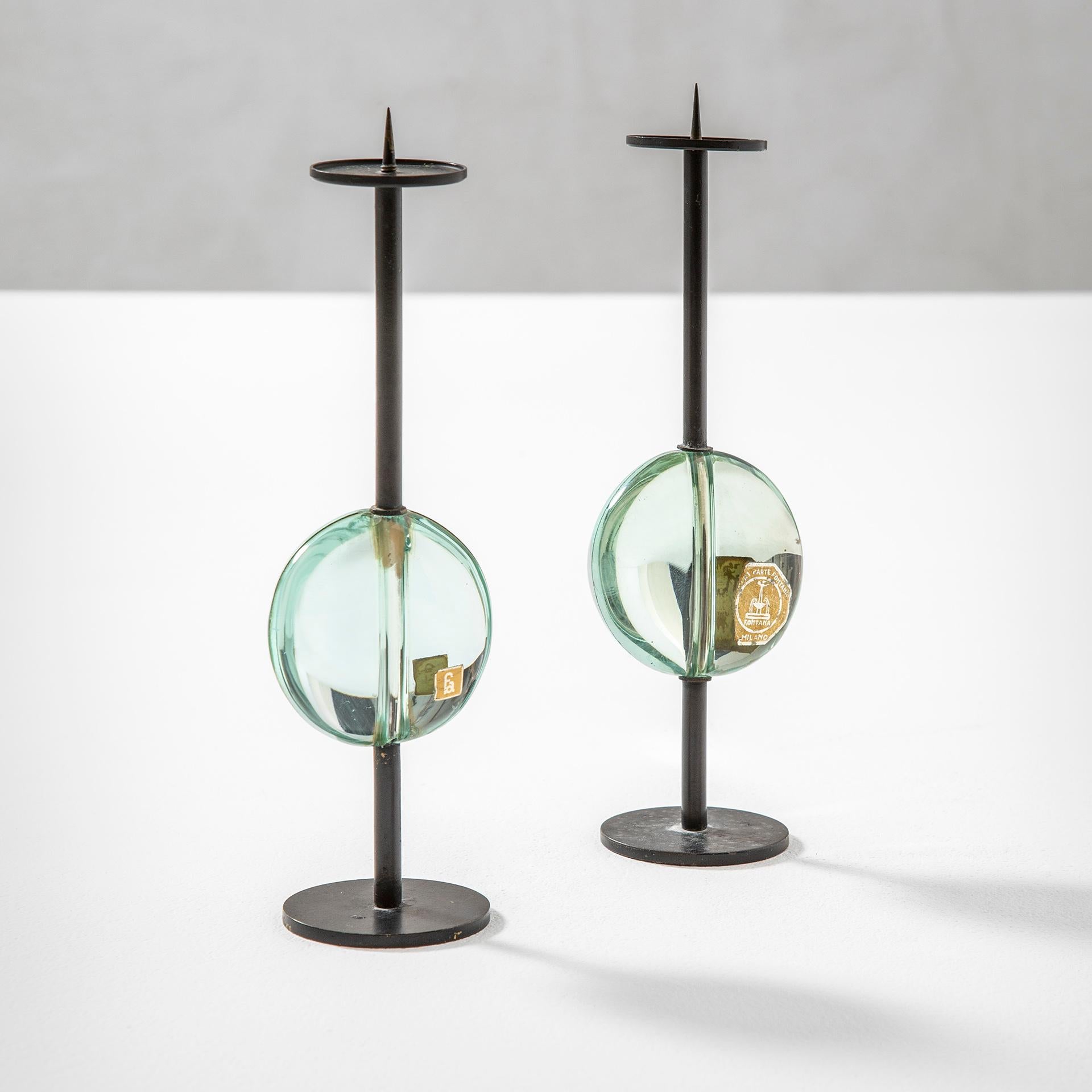Pair of candleholders designed by Max Ingrand for Fontana Arte.
The couple of candleholders are in metal with a handmade decoration in glass. Each Candleholder has the original Fontana Arte markbrand as shown in photos.
Great idea for wedding's
