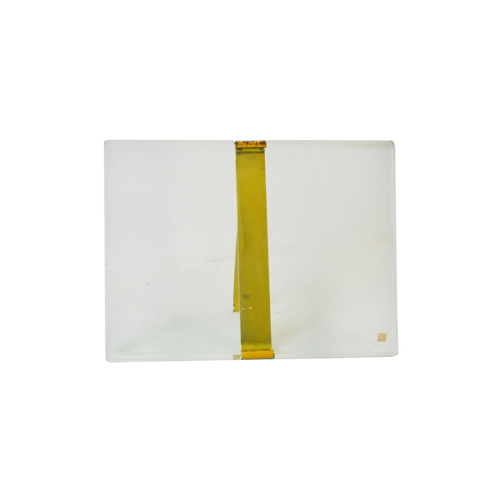 Picture frame model n. 1371 designed by Max Ingrand for Fontana Arte in 1960s. The picture frame is in glass and brass, with patina of time especially on the brass detail. The picture frame itself measures: 24 x 18 cm. Presence of brand logo Fontana