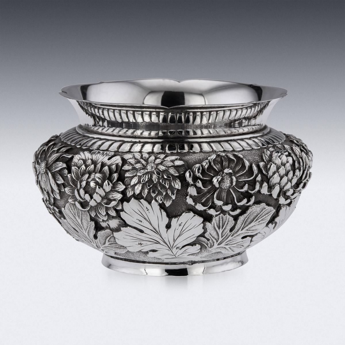 20th century Japanese Meiji period solid silver bowl, double walled, densely chased and embossed with blossoming irises on matted hand hammered ground, shaped floral rim and standing on a round shaped base.
Hallmarked with the “jungin”, meaning