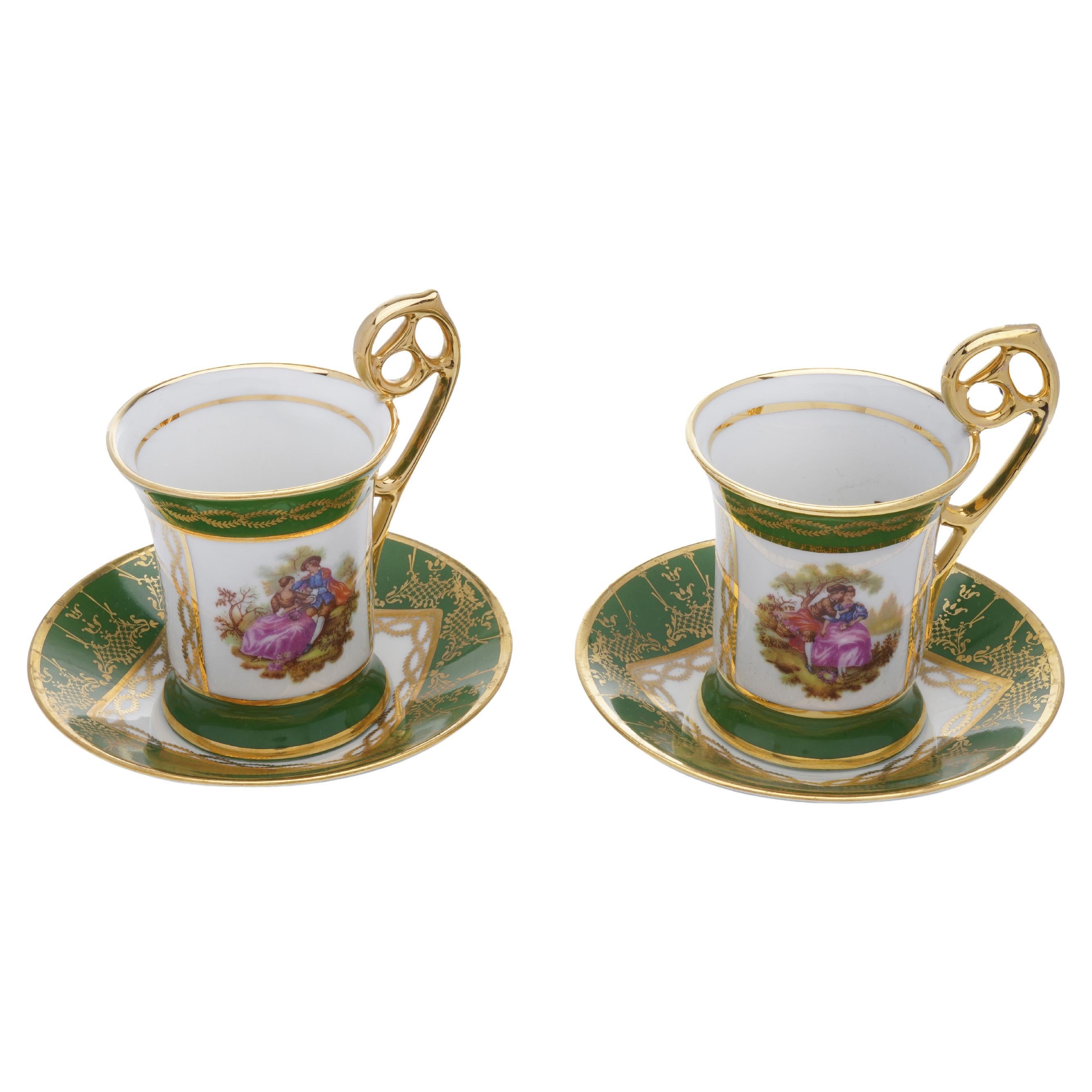 Pareja de taza y platillo Demitasse de porcelana de Meissner Limoges del siglo XX