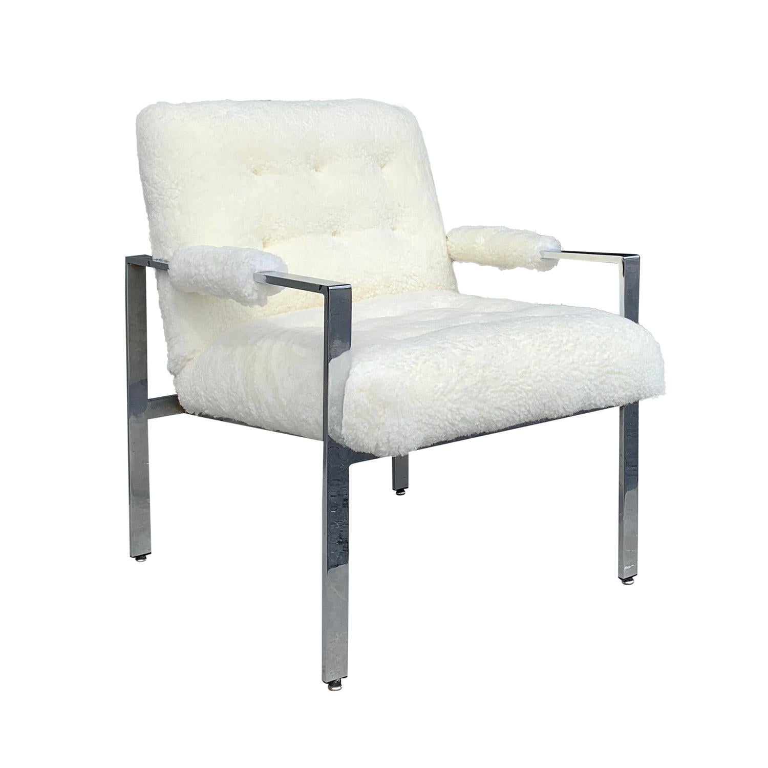 A vintage Mid-Century Modern American armchair made of a chromed aluminum frame, designed by Milo Baughman in good condition. Newly upholstered in white natural sheepskin. Wear consistent with age and use. Circa 1960 - 1970, United States.

Seat