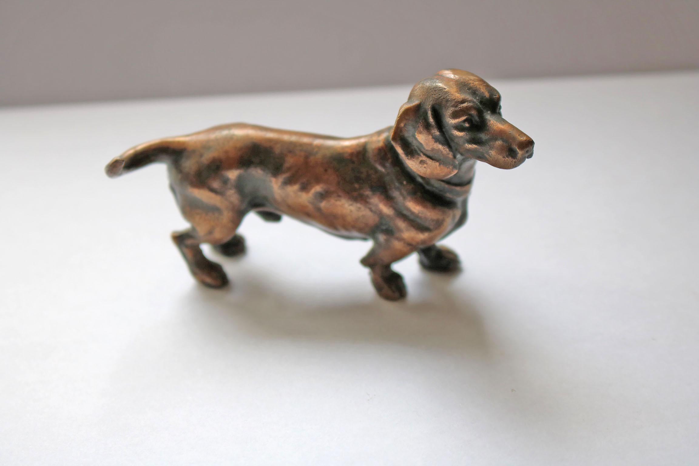 A beautiful miniature bronze sculpture, part of a collection