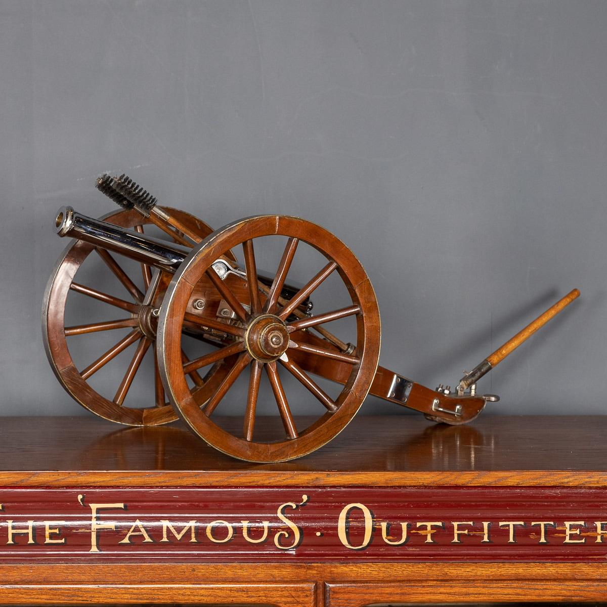 A mid 20th century a large model (approximately a quarter scale) of a 12 pound Cannon Field Gun, used during the Napoleonic Wars 1857. With wooden wheels and shaft and polished metal cannon with details. This items makes for a fantastic conversation
