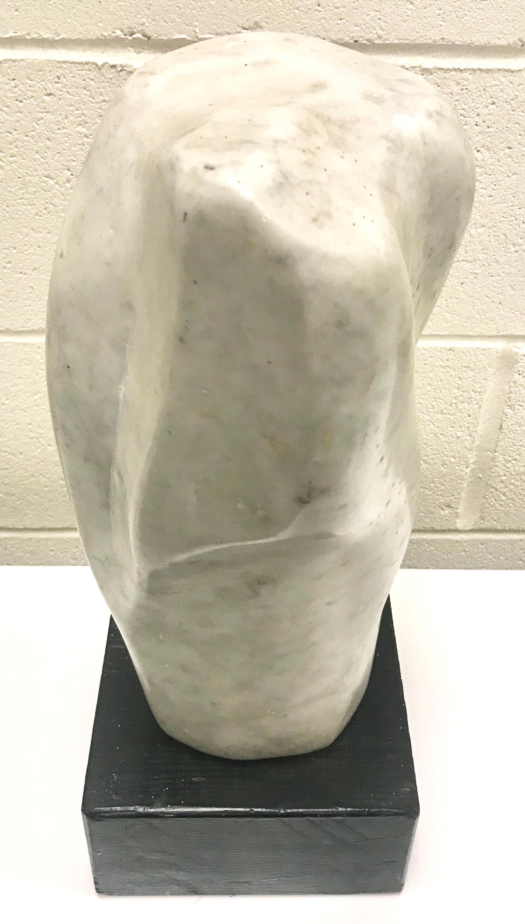 Modern art Carrera marble sculpture mounted on a wood base.