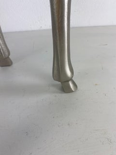 20th century modern empire style stool with cowhide upholstery