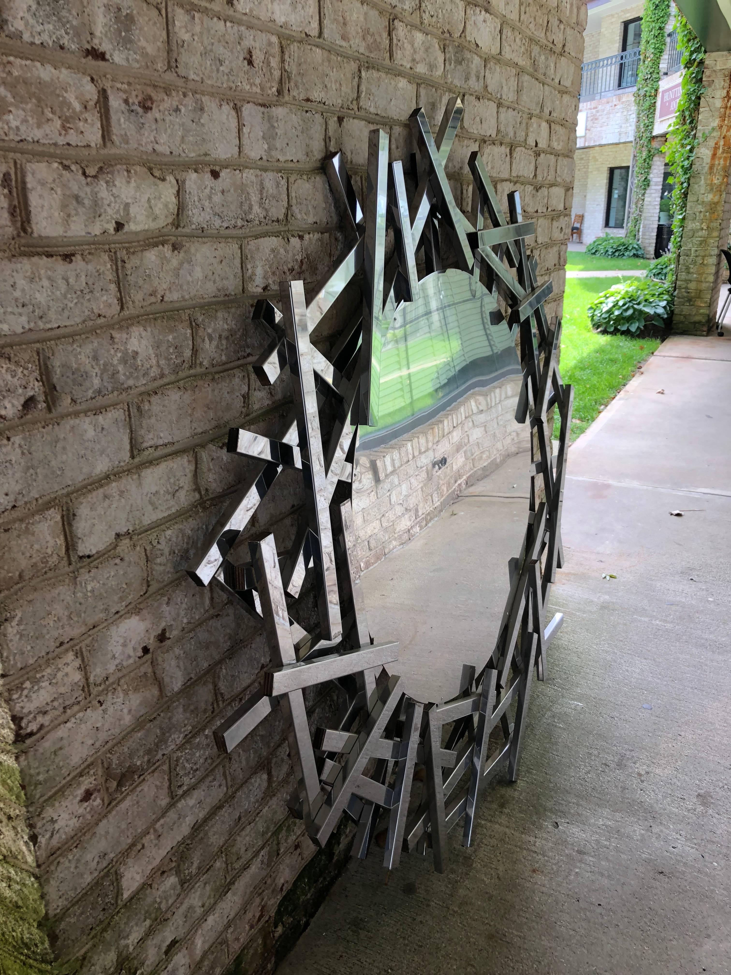 Exceptional mirror custom-made and unique piece by a young French artist.