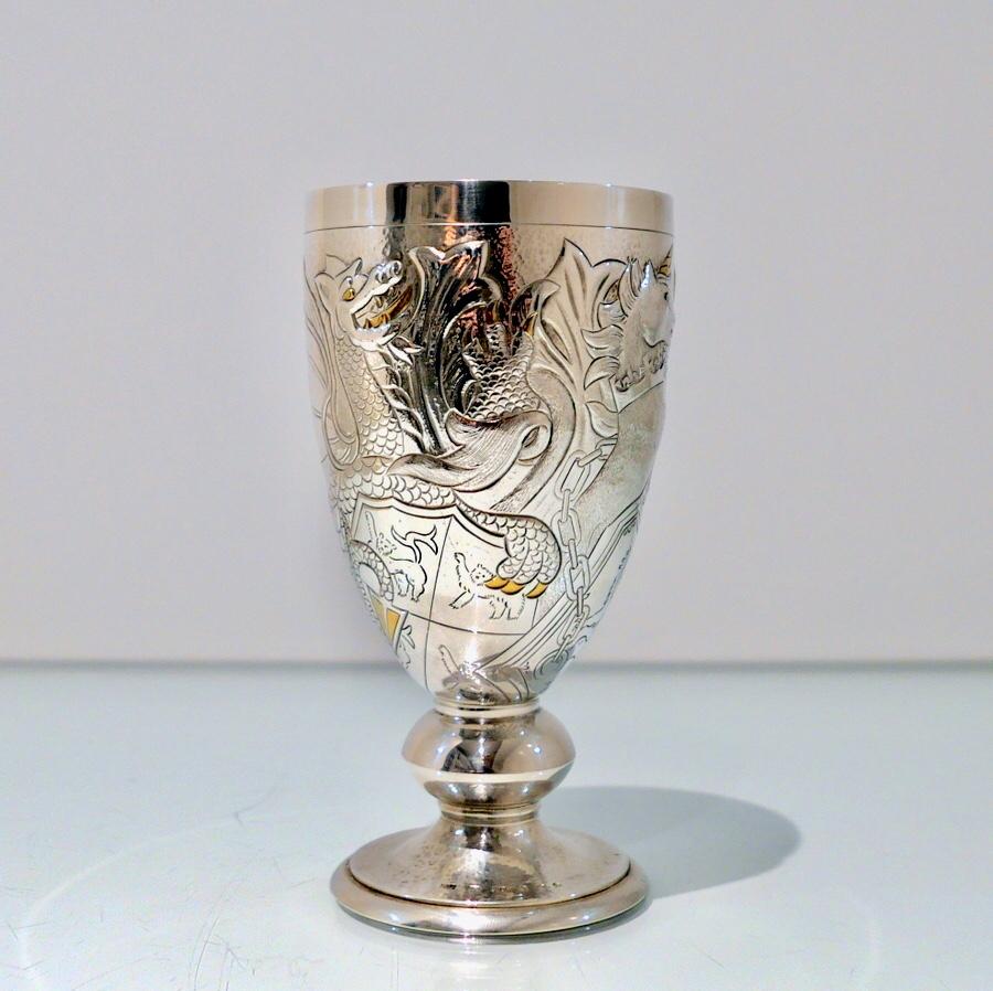 A silver parcel gilt commemorative goblet, London 2002, Richard Jarvis, the Golden Jubilee of Queen Elizabeth II, with chased heraldic decoration, The Lion of England, The Red Dragon of Wales and The Unicorn of Scotland, limited edition of