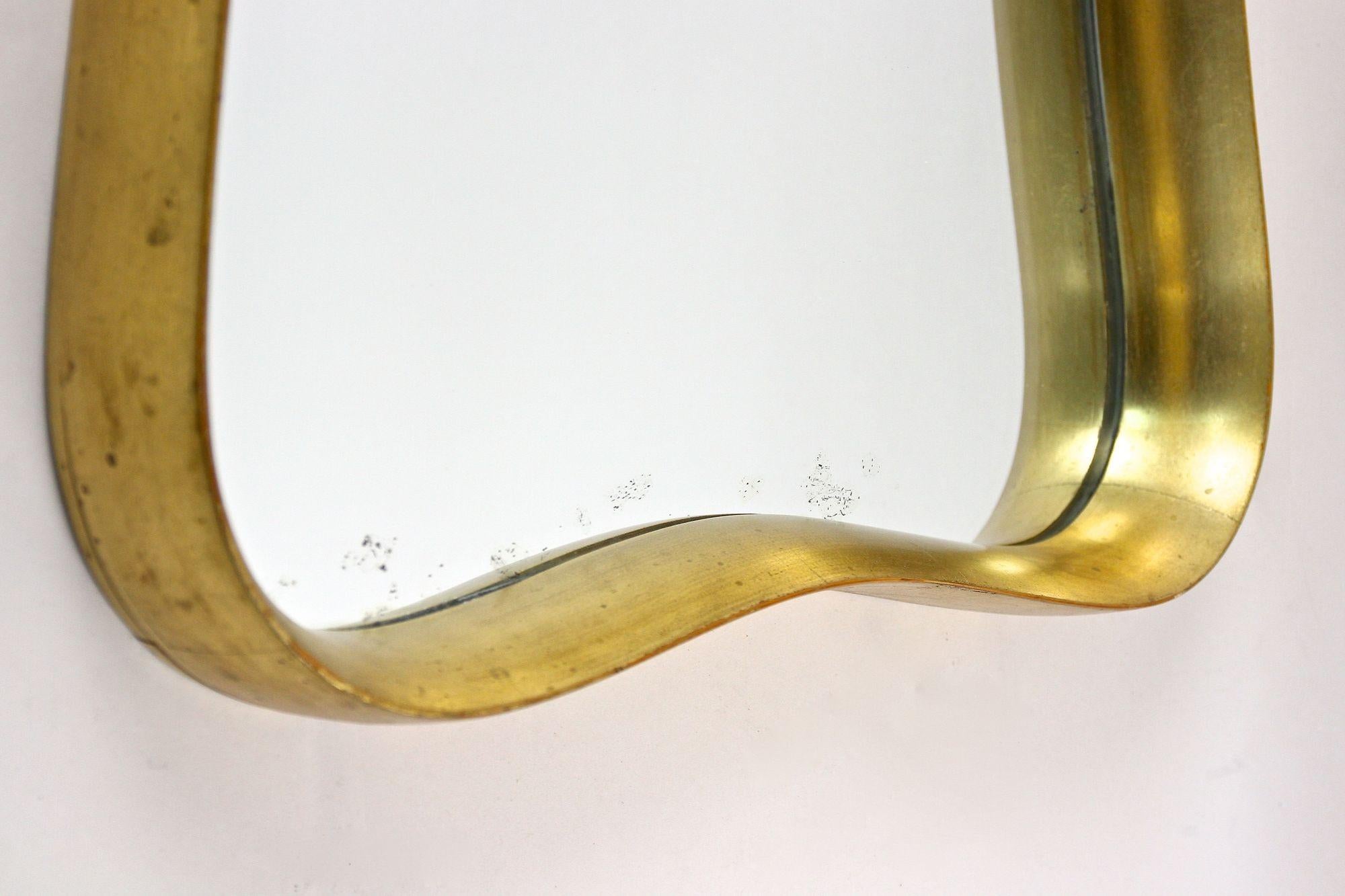 Doré 20th Century Modernist Gilt Wall Mirror Attributed to Max Welz, Austria ca.1940s en vente