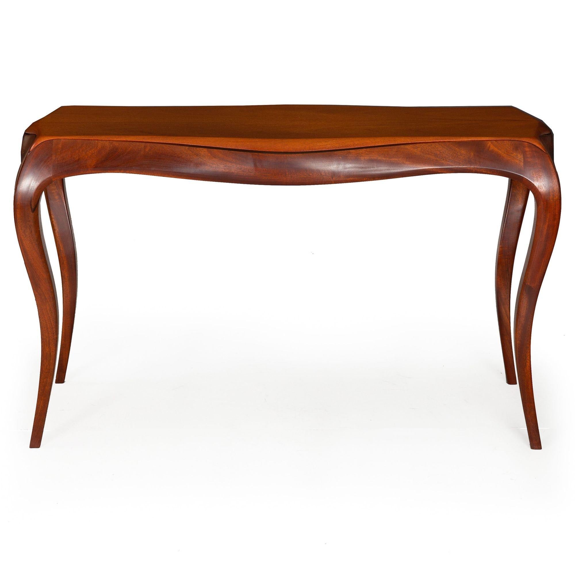 MODERNIST MAHOGANY SERPENTINE CONSOLE TABLE
Two available  probably late 20th century  carved initials to the underside 