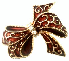 20th Century Monet Gold Enamel & Crystal Dimensional Holiday Bow Brooch