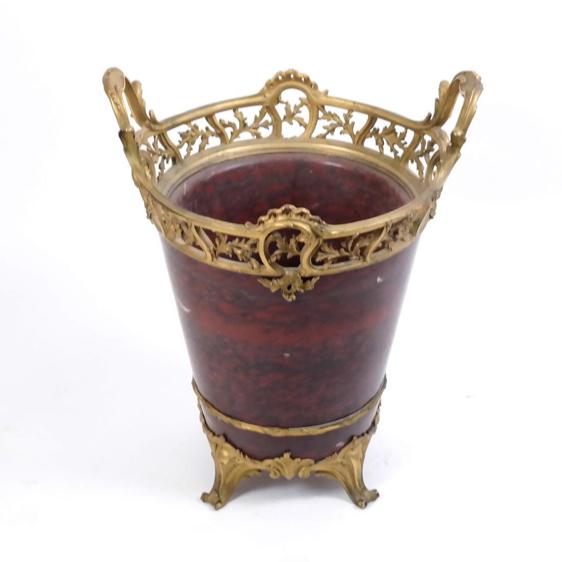 A rare early 20th century monumental gilt bronze mounted rouge marble planter centerpiece attributed F. Linke 

Maker: attributed to François Linke (1855-1946) 
Date: circa 1900 
Origin: French
Dimension: 21 in. x 17 in.