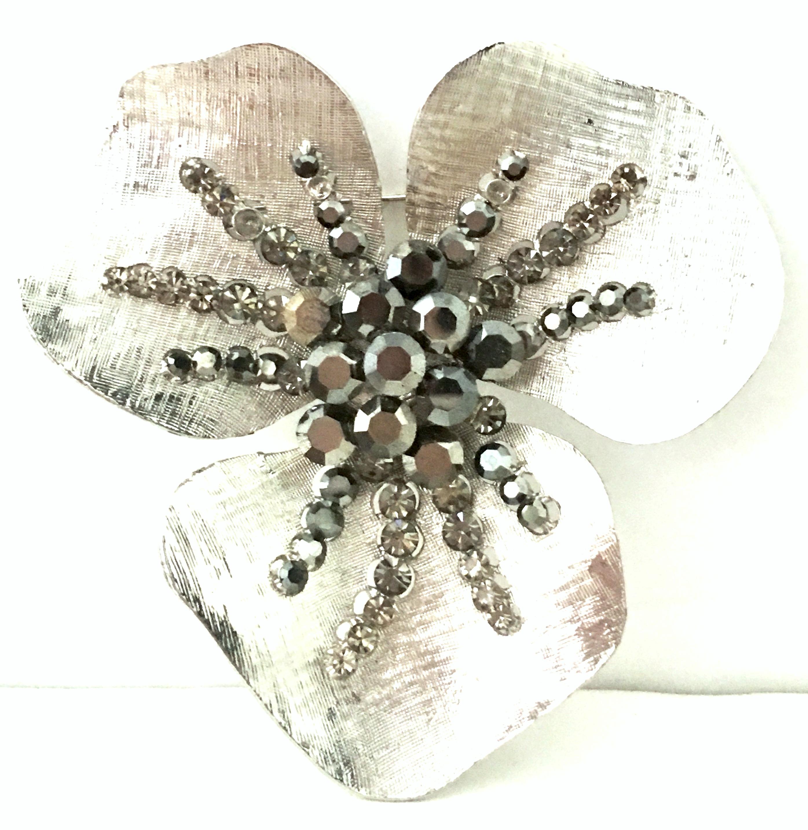 20th Century Monumental Silver & Austrian Crystal  Dimensional & Abstract Flower Brooch. Features silver tone textured metal with black, colorless and gunsmoke brilliant cut and faceted Austrian crystal stones. 