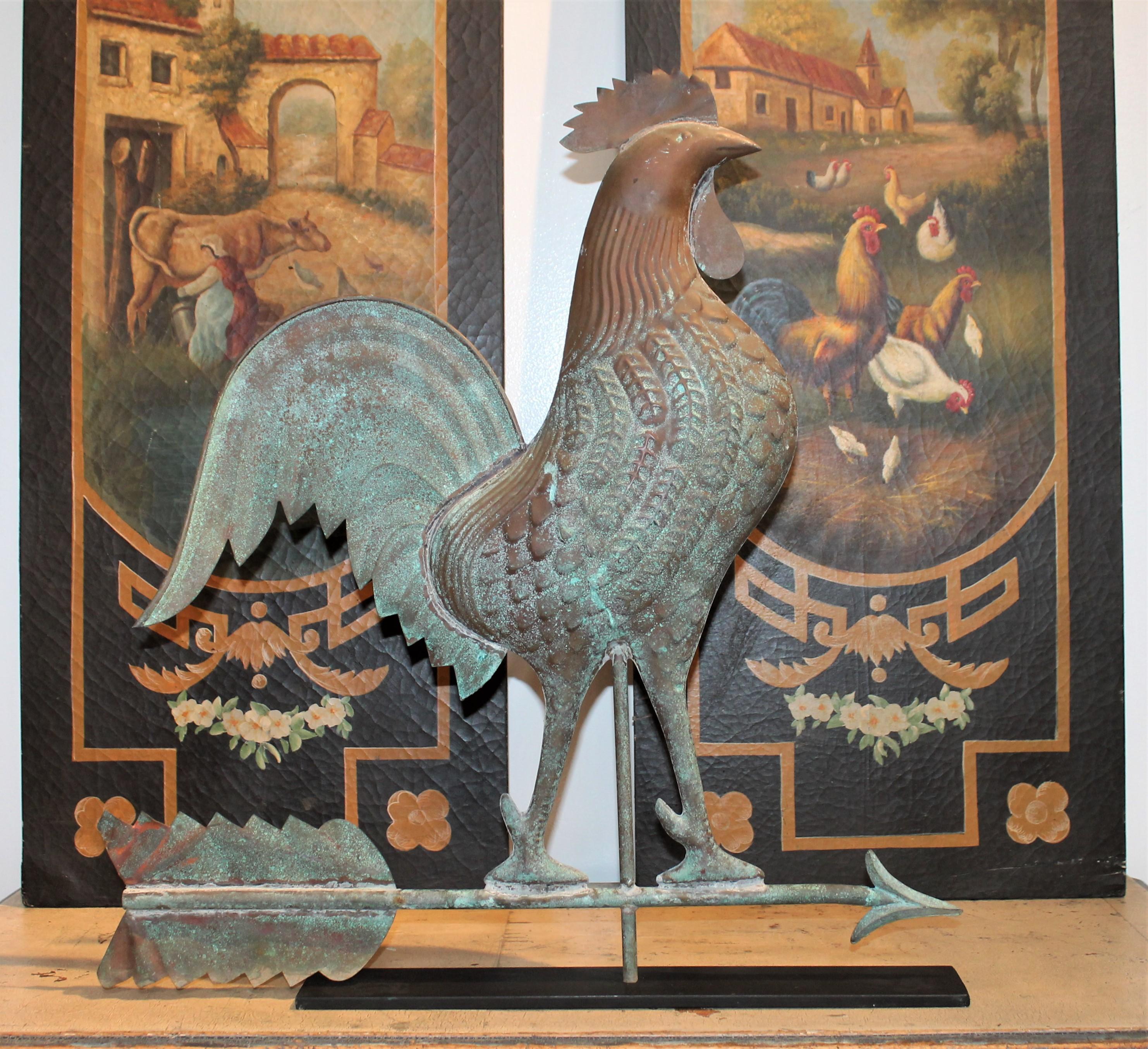 This fine copper rooster weather vane has a wonderful undisturbed surface and wear. There are minor dents or marks on the tail feathers of the arrow. No bullet holes or other dents. This late but great copper cock has a fantastic presents. The iron