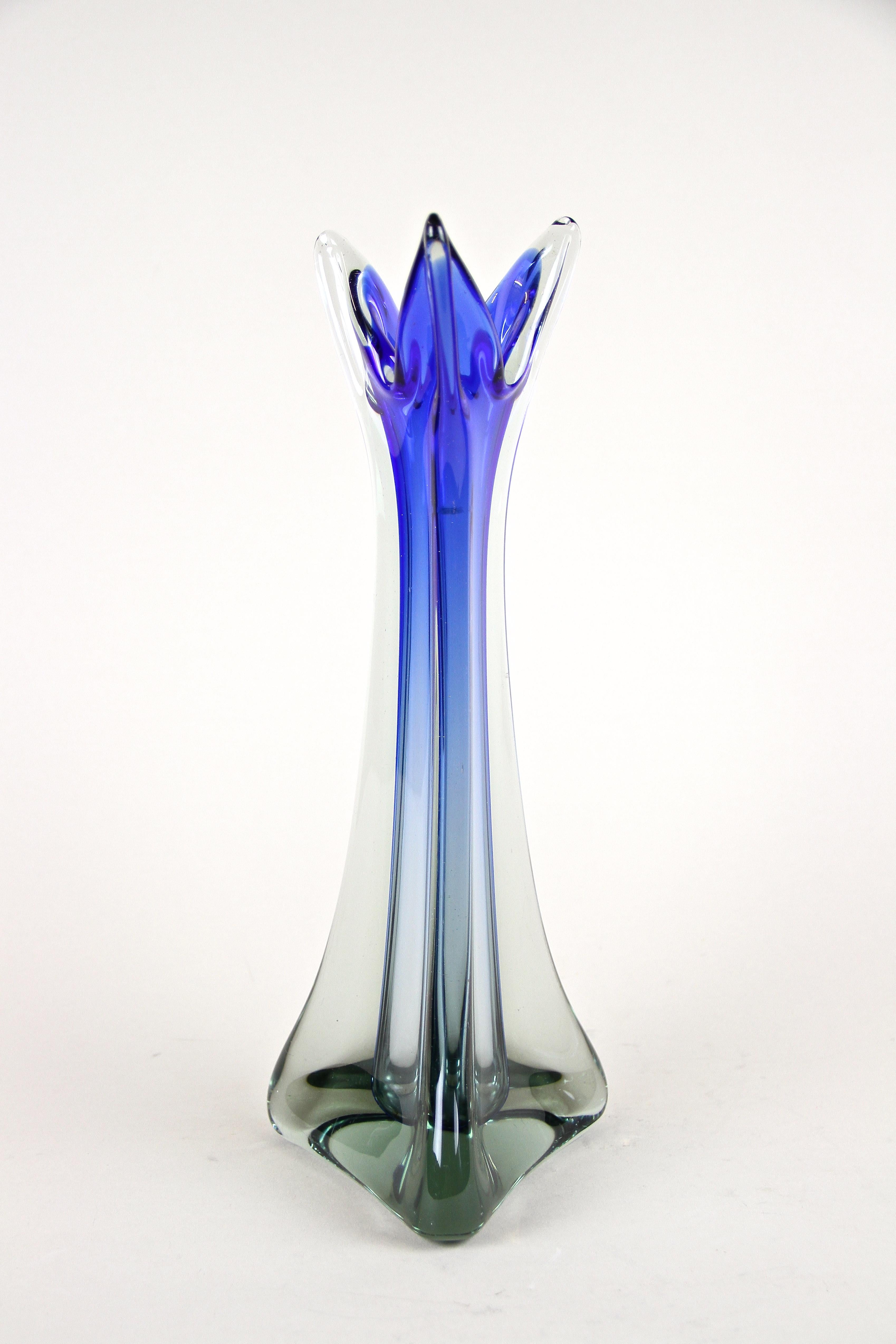 Elegant, triangular shaped 20th century Murano Glass Vase out of Italy around 1970. Artfully handcrafted by Salviati & Co on the famous island of Murano, this timeless designed Murano vase impresses with an absolute fantastic coloration: a unique