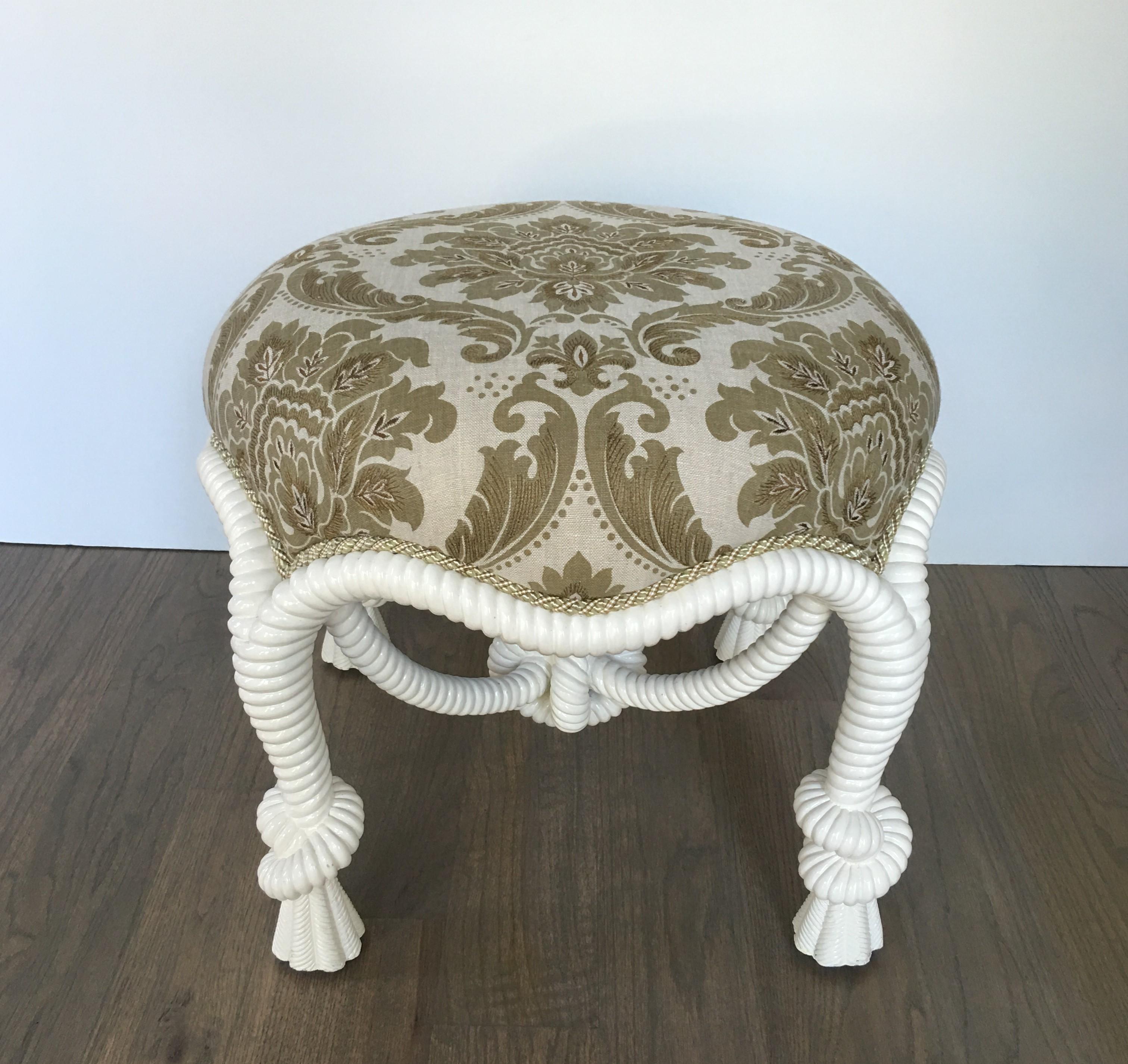 Napoleon III style stool or ottoman with twisted rope design after the model by A.M.E. Fournier, circa 20th century. Lacquered, the piece has a fabric circular seat on rope-twist molded seat-rails on knotted rope legs joined by an X-stretcher with a