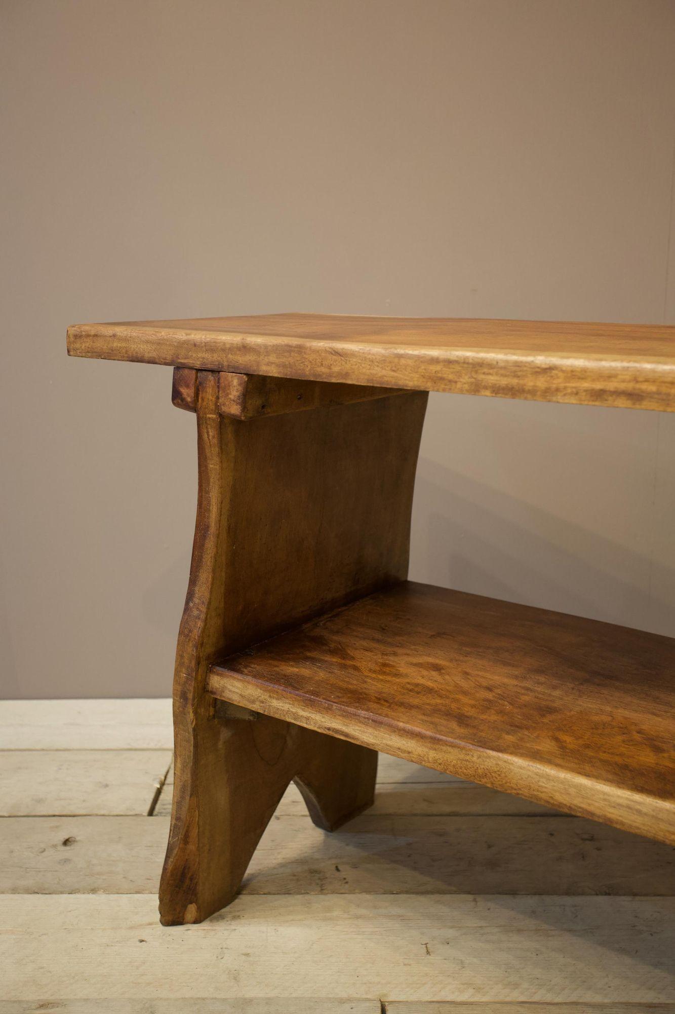 This is a very stylish 20th century naturalistic Amboyna wood console table. Gorgeous design which works so well in a large number of interiors. Very heavy and in overall great condition. The timber as well has a lovely colour to it and figuring.