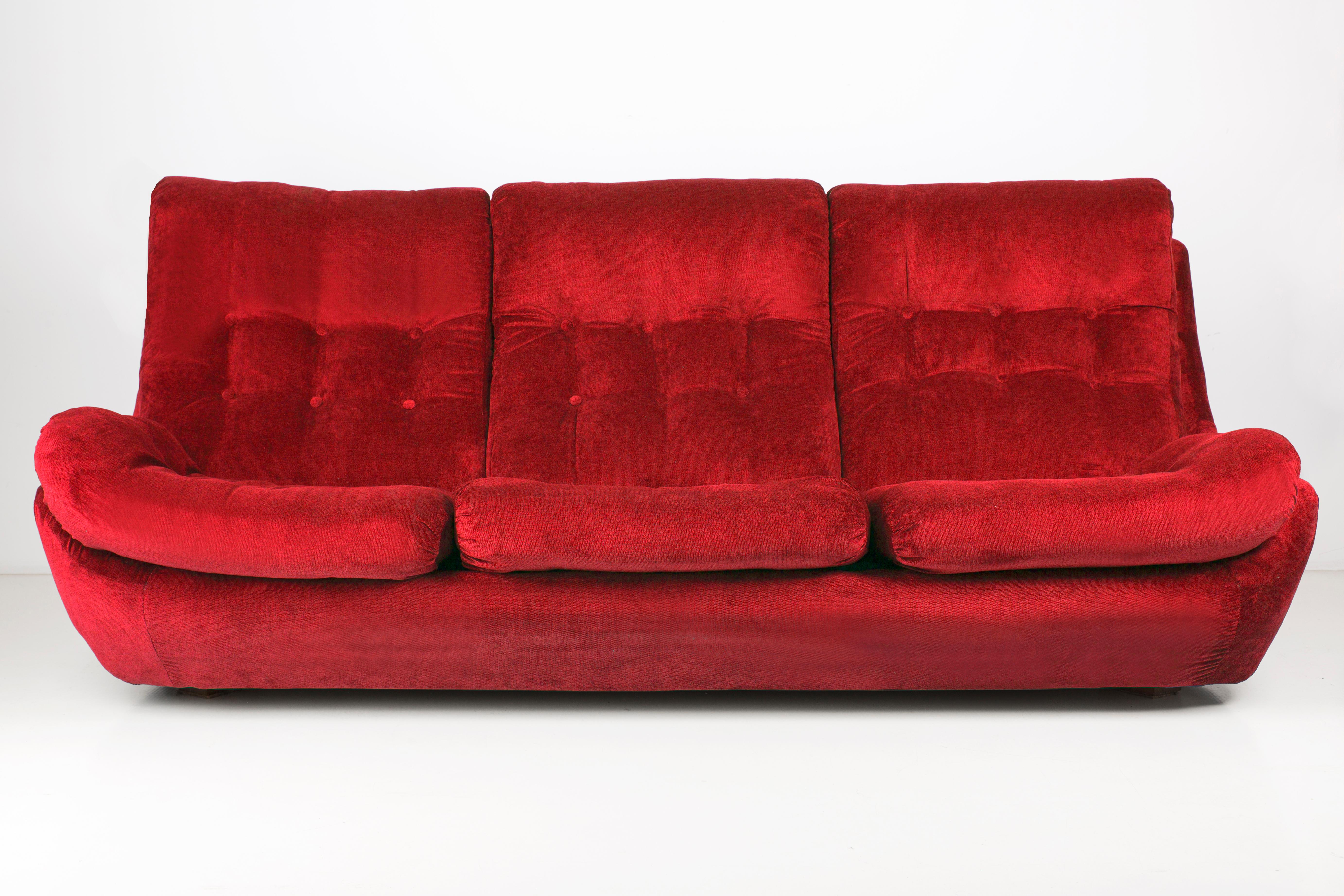 Atlantis sofa from the 1960s, produced in Czech Republic - at the moment they are unique. Due to their dimensions, they perfectly blend in even in small apartments providing comfort and beautiful decoration. Covered with high-quality velvet fabric,