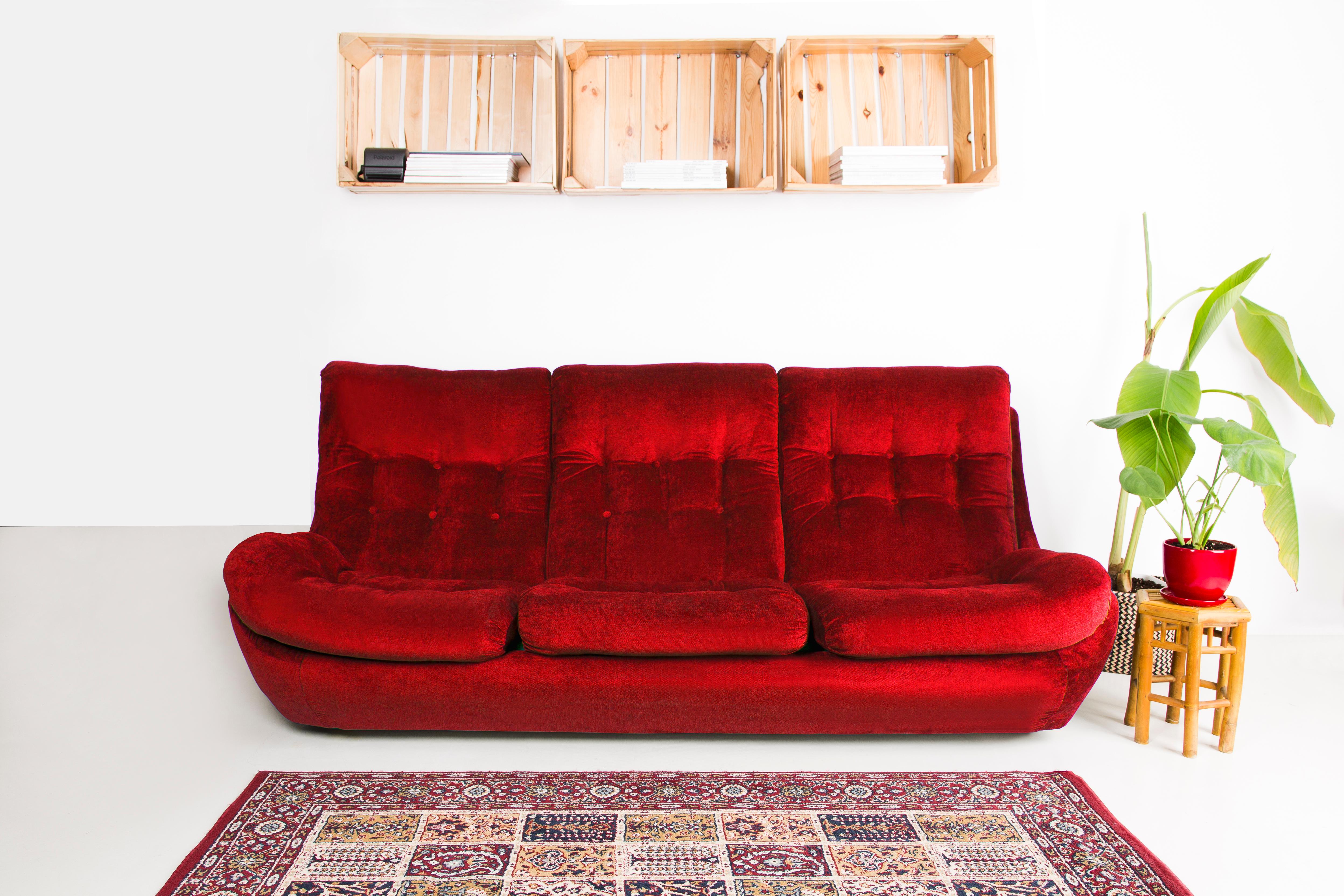 vintage red velvet sofa