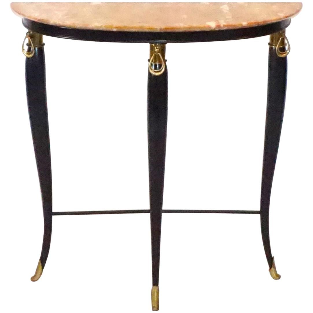 A vintage Art Deco Italian neoclassical style demilune console table, designed by Paolo Buffa, in a stunning curved shape, carved rosewood and an original Brescia Primavera marble top with gilded sabots in good condition. Wear consistent with age