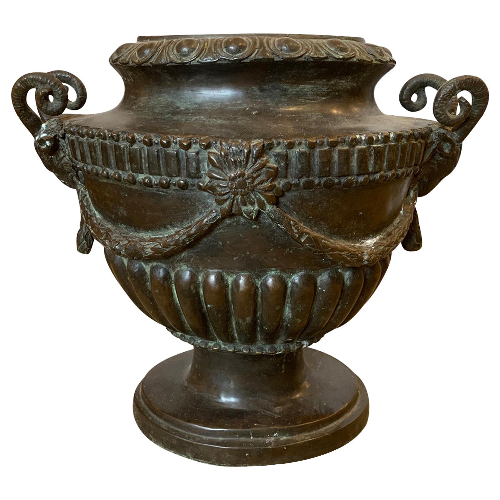 20th Century Neoclassical Oval Bronze Urn with Rams Heads For Sale