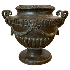 20th Century Neoclassical Oval Bronze Urn with Rams Heads