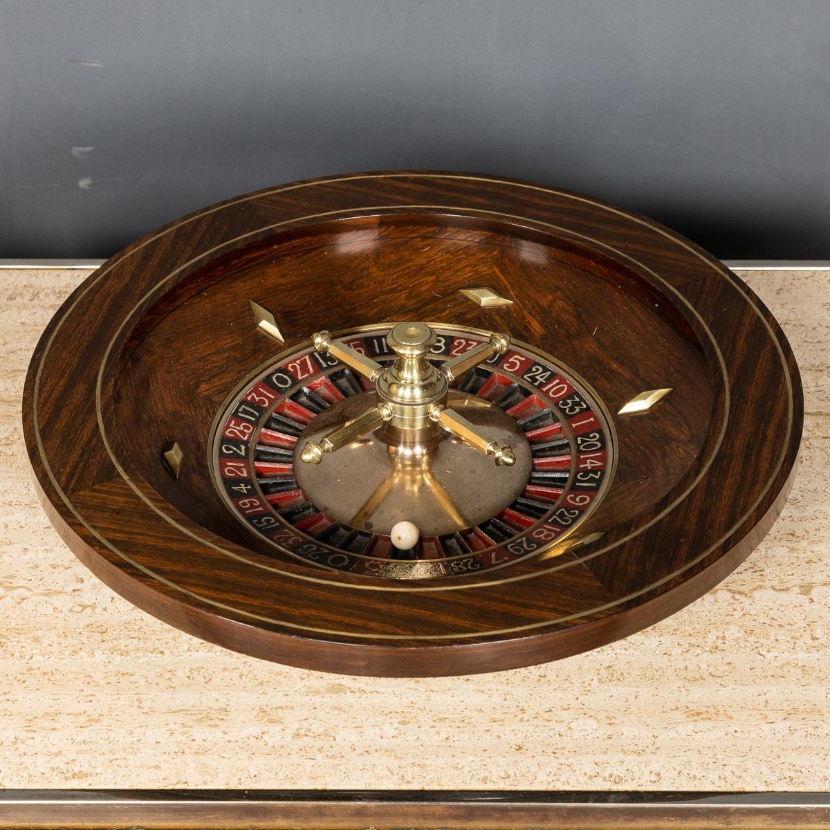 A particularly rare and stylish early 20th century novelty roulette wheel, the polished veneered wood, with working spinning centre, extremely stylish and in great condition. A perfect addition to a stylish games room.

CONDITION
In Good Condition -