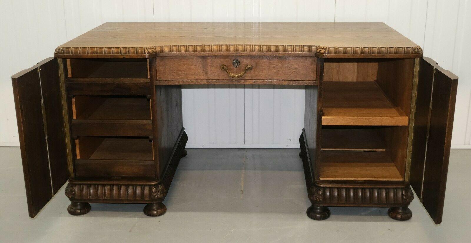 Hand-Crafted 20th Century Oak Desk with Grapes and Vine Leaves Carvings & Sliding Shelves For Sale