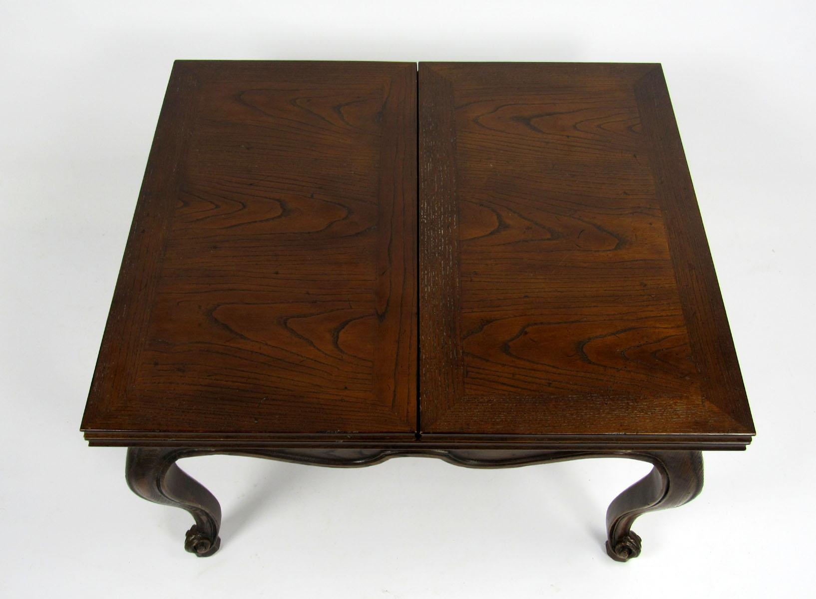 20th century Henredon cocktail table made from oak.
Tabletop flips open and expands to 56