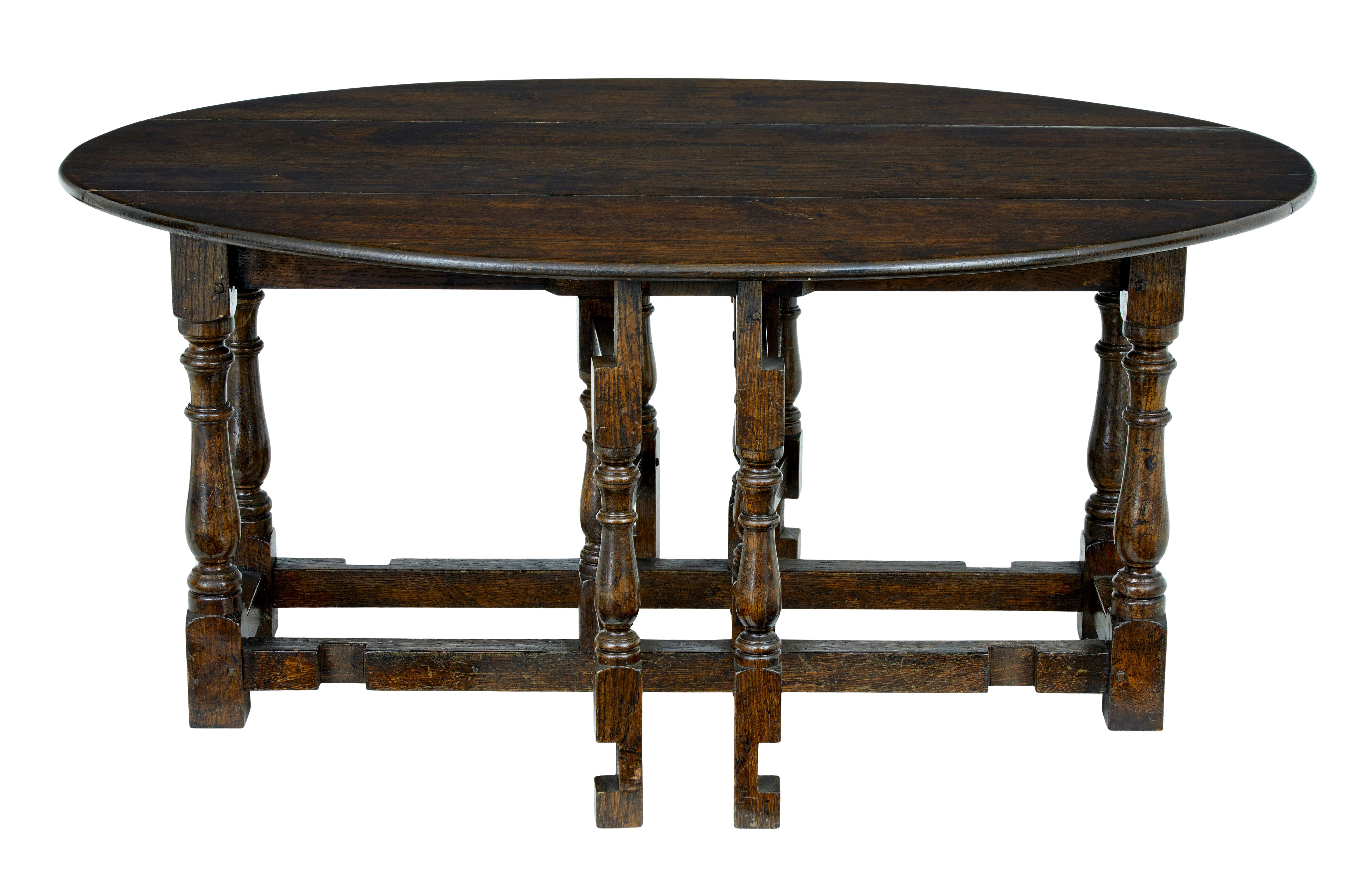 Good quality Georgian style oak gateleg table.

Gateleg design which has been incorparated into coffee table for modern day use.

Solid oak used, minor surface marks to legs. Top opens to form a oval shaped top.

Depth open: 35 1/2