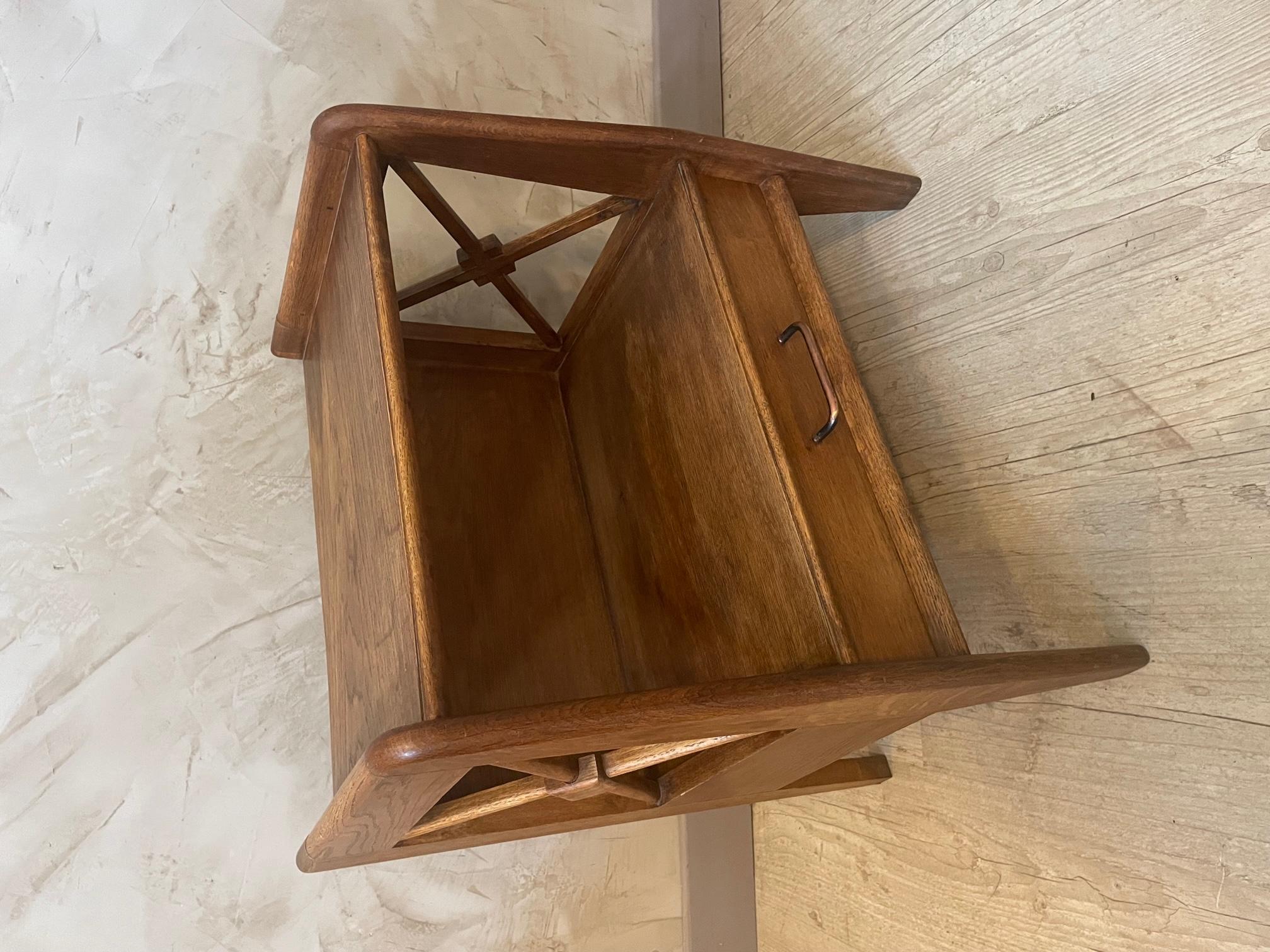 Very nice 20th century Jacques Adnet oak side table from the 1960s. 
One drawer with a copper handle. 
Very good condition.
