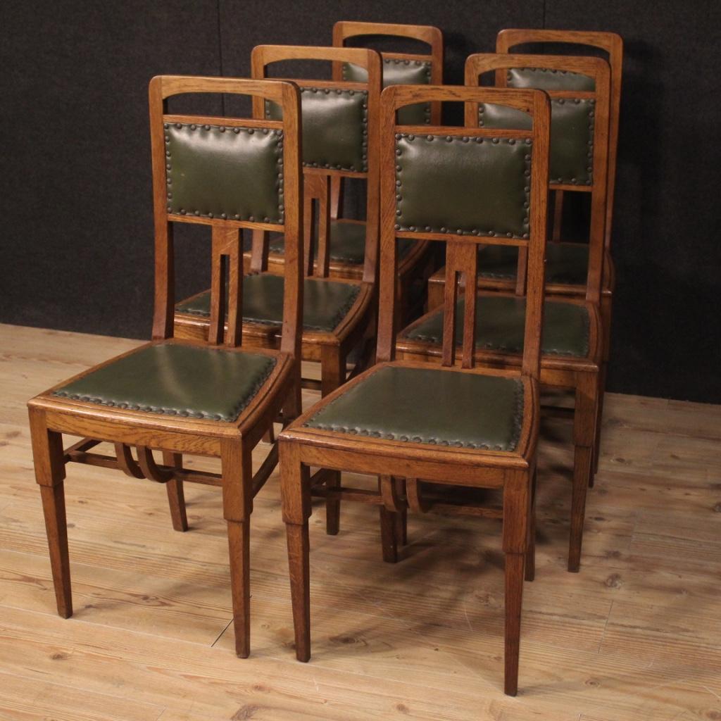 Six French chairs from the early 20th century. Art Deco furniture carved in oakwood of beautiful line and pleasant decor. Seats and backs replaced during the 20th century covered in faux leather with some signs (see photo) of moderate comfort.