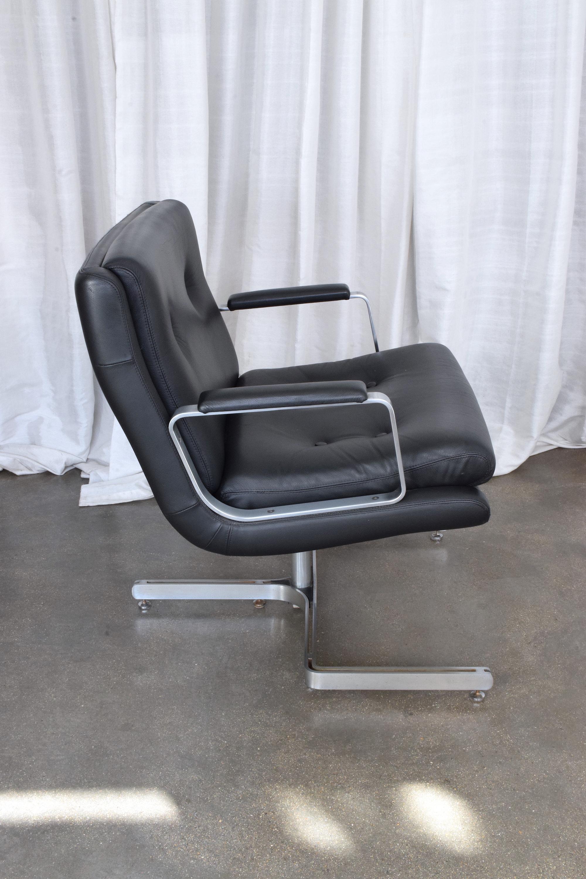 A highly collectible vintage lounge or office chairs by iconic French designer Raphael Raffel designed in stainless steel and black leather with its distinctive tripod shaped structure.
We have included two images of the book in which this model