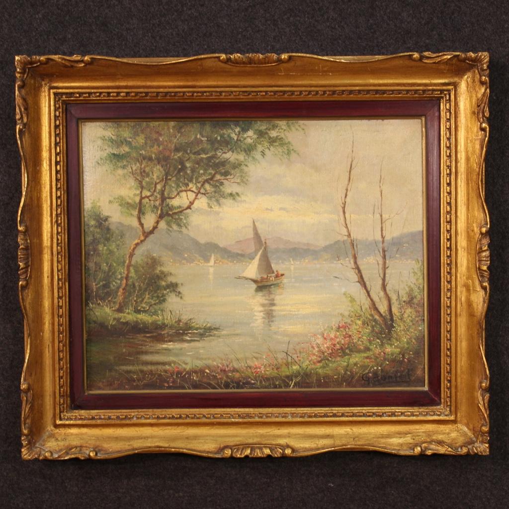 French painting from the mid 20th century. Framework oil on canvas (glued on a board), depicting a pleasant view of the lake with sailboats of good pictorial quality. Painting of excellent proportion adorned with a carved and gilded wooden frame