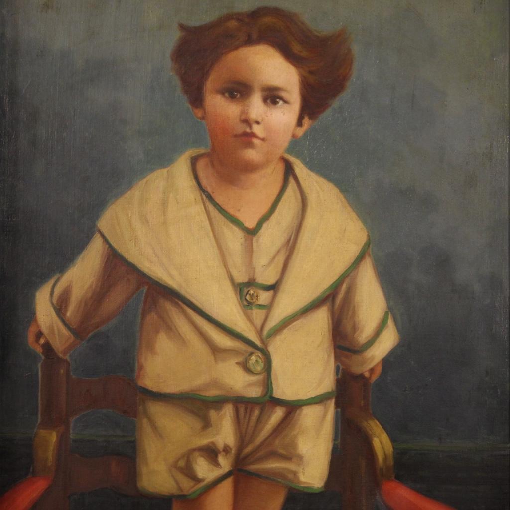 Italian painting dated 1921. Framework oil on canvas, on the first canvas, depicting a portrait of a child on an armchair of good pictorial quality. Chiseled and gilded wooden frame (bronze tint) of beautiful decoration. Painting that develops