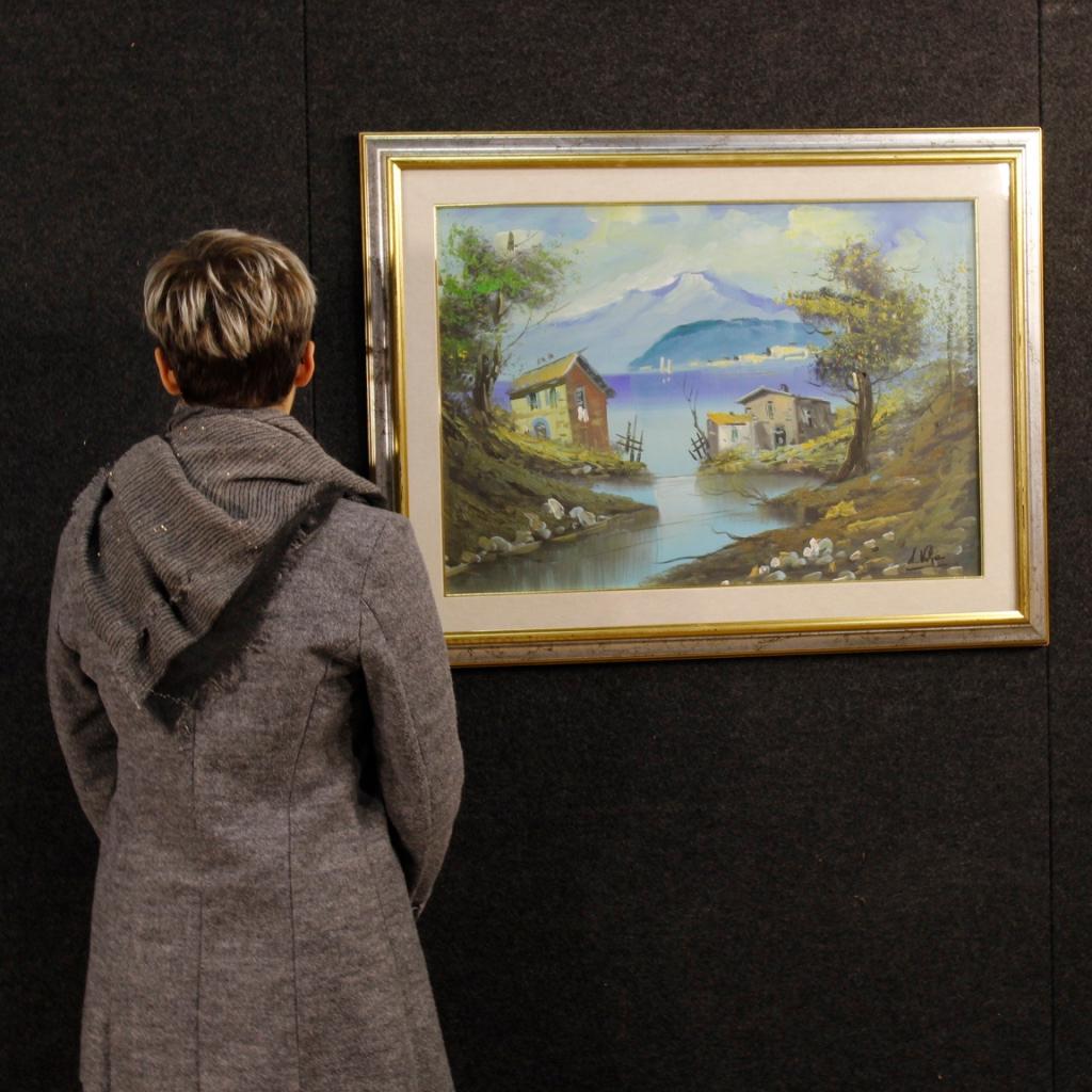 Italian Huile sur toile italienne du 20ème siècle, peinture de paysage signée représentant une vue de lac, 1960 en vente