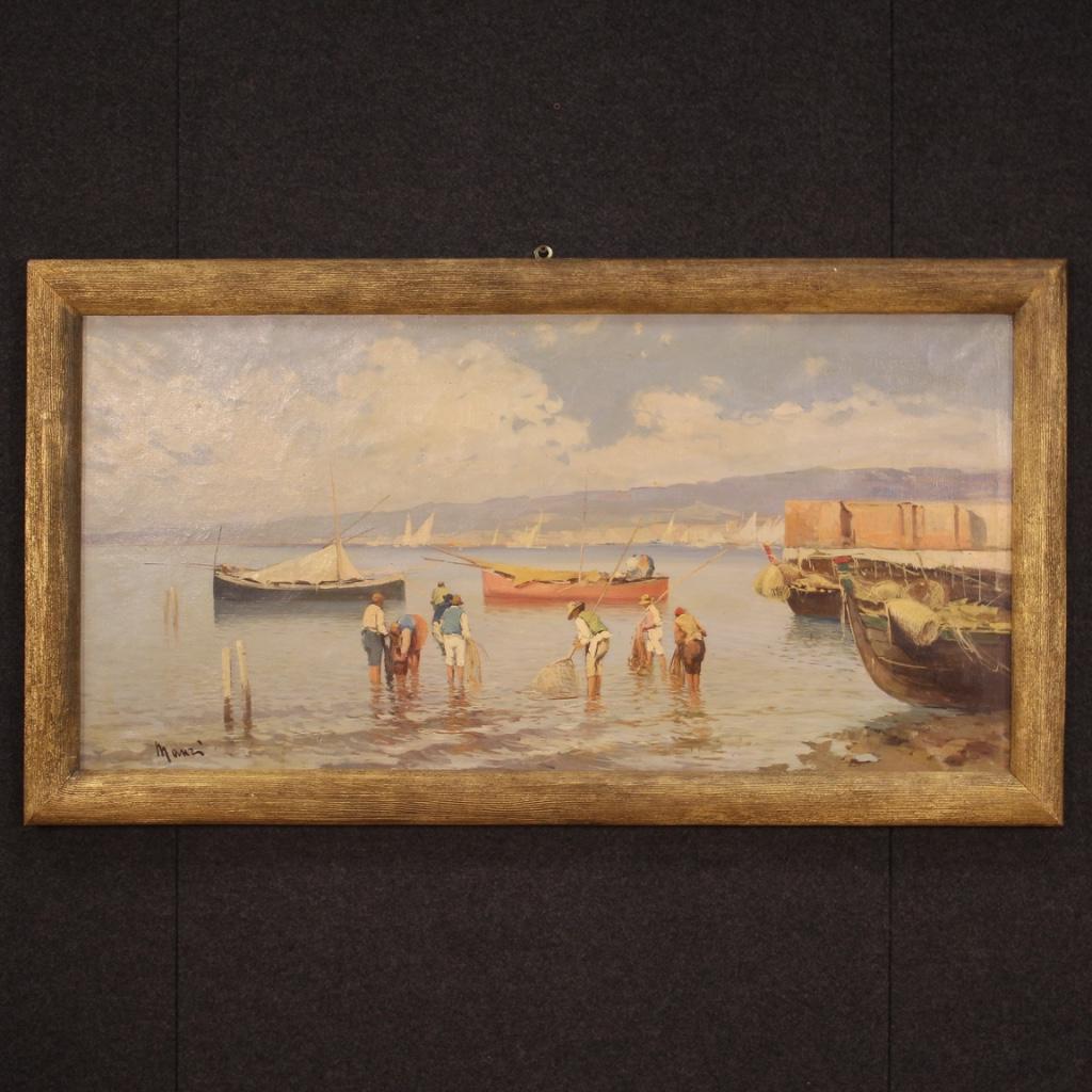 Italian painting from 20th century. Framework oil on canvas, first canvas, depicting seascape View with boats and fishermen of good pictorial quality. Nice size framework of pleasant decor adorned with a chiseled and gilded wooden frame. Painting of