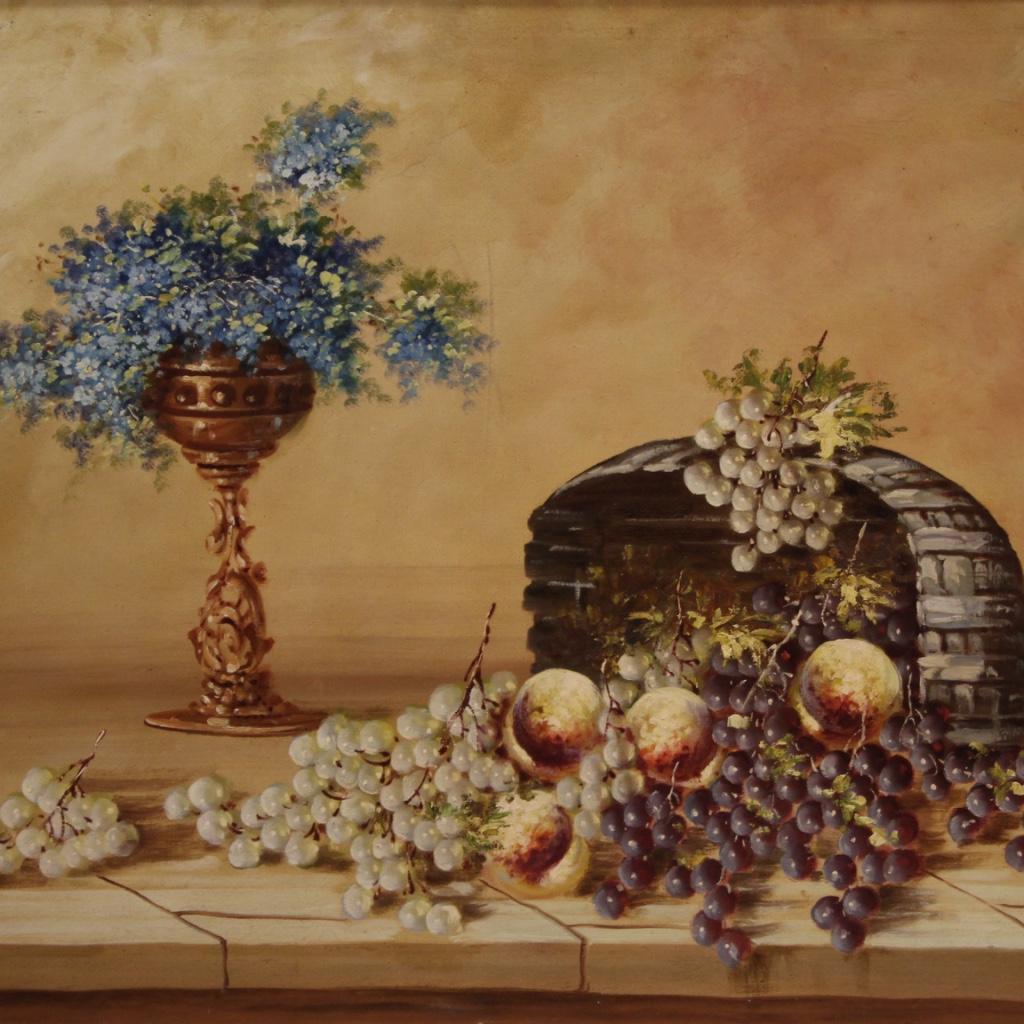 Great Italian painting from the mid-20th century. Work oil on canvas, first canvas, depicting still life with flowers and fruit of good pictorial quality. Very bright painting complete with finely chiseled and gilded wooden and plaster frame with