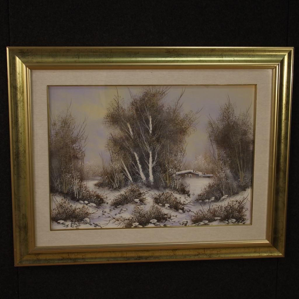 Italian painting of the second half of the 20th century. Oil painting on canvas depicting a winter forest landscape with a small house in the background. Framework signed on the bottom left (see photo) signature under study. Modern golden wooden