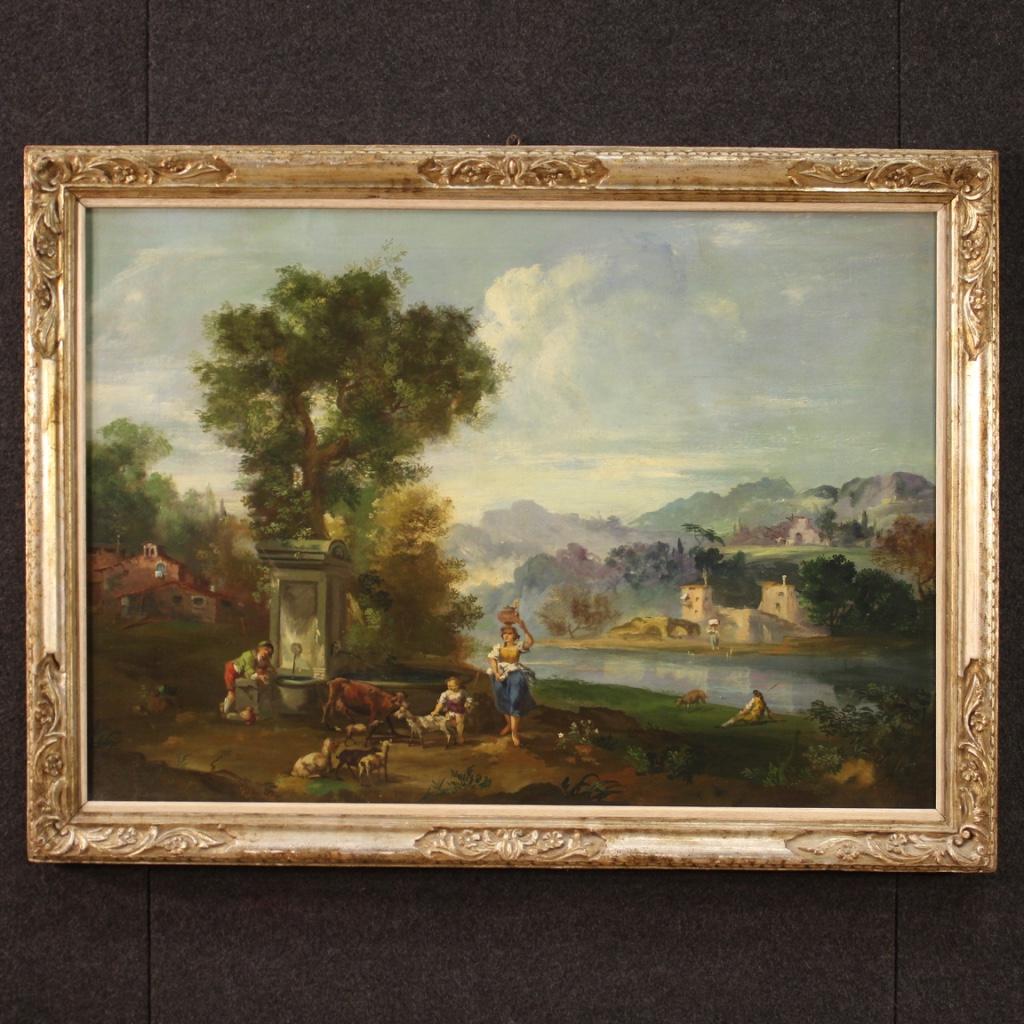 Italian painting from the mid-20th century. Oil on canvas framework of fabulous decor depicting landscape with figures and architecture in 18th century style. Nice size and pleasant impact painting with carved and silvered wooden frame with some