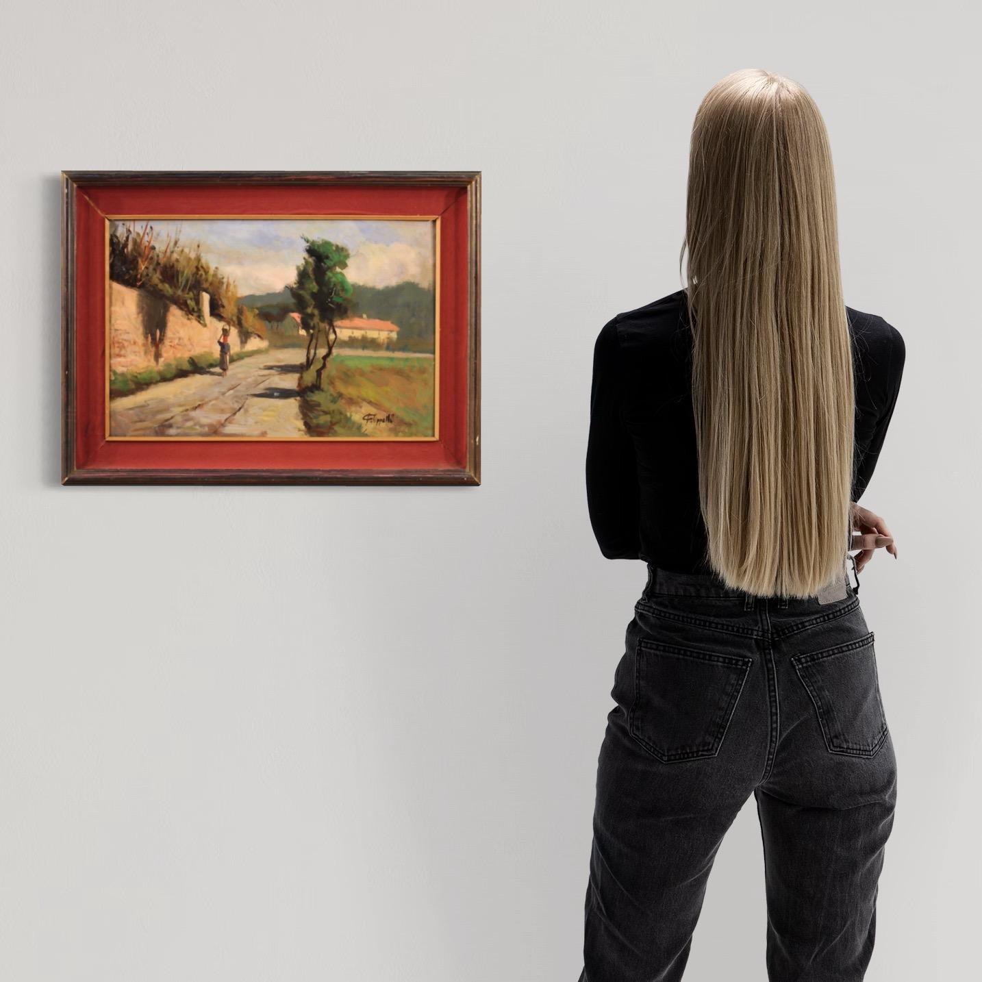 Italian painting from the mid-20th century. Oil on masonite artwork depicting a country landscape with a peasant woman of good pictorial quality. Painting of beautiful size and proportion adorned with a wooden frame with paper passe-partout (faux