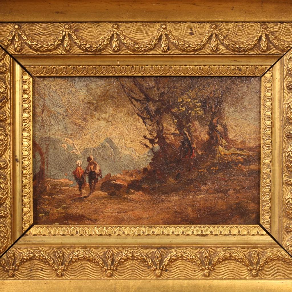 Small Italian painting from 20th century. Oil painting on Masonite depicting landscape with characters in antique style of good pictorial quality. Wooden and plaster frame, carved and gilded, beautifully decorated. Small framework, for antique