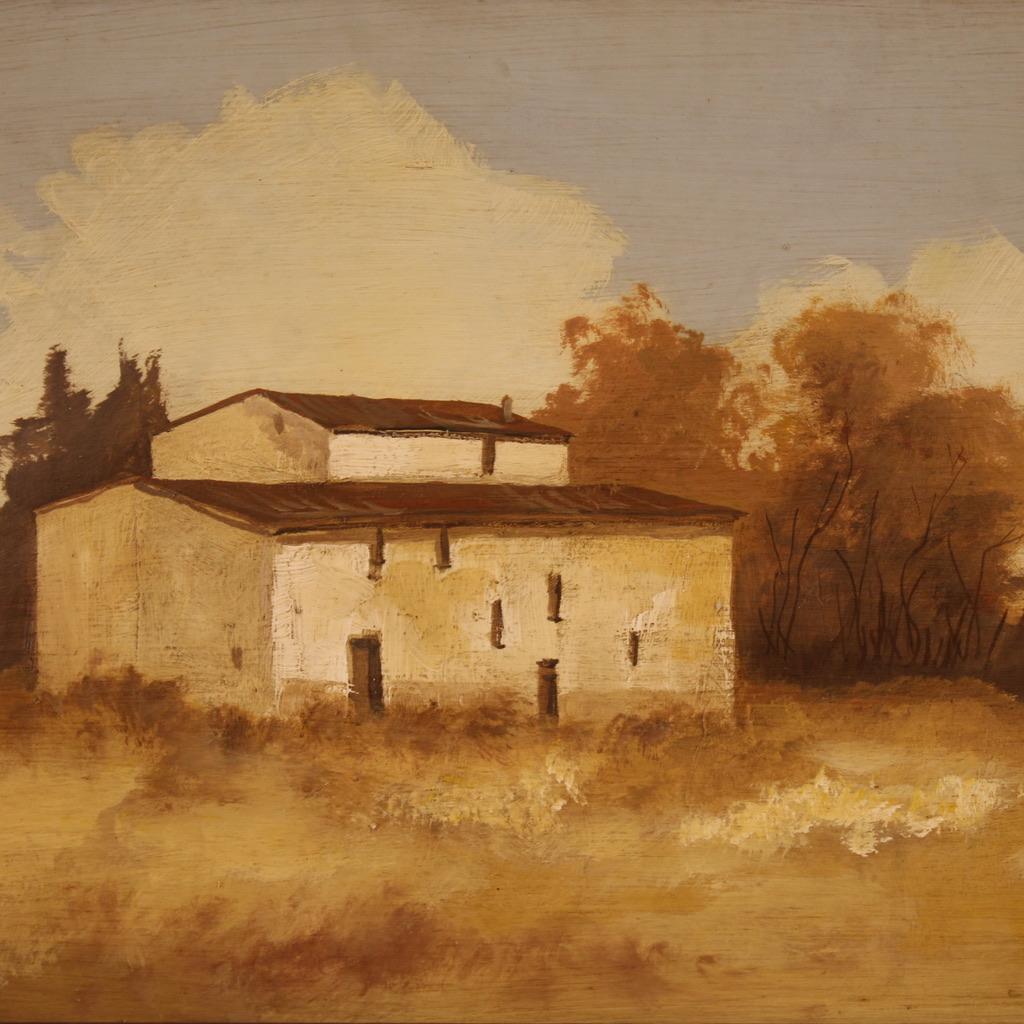 Italian painting from the second half of the 20th century. Artwork oil on masonite depicting a view with a small house of good pictorial quality. Painting adorned with an octagonal wooden frame carved and enriched with golden reflections on the