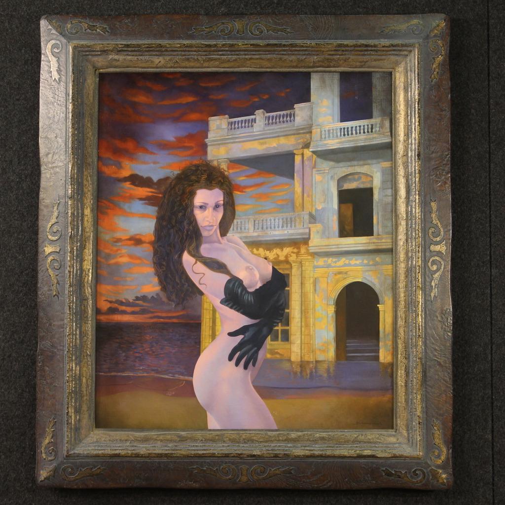 French painting from the late 20th century. Oil on panel artwork depicting a female nude, a sensual girl with a fantasy landscape of metaphysical style, of good pictorial quality. Modern carved, chiseled and lacquered wooden frame of beautiful