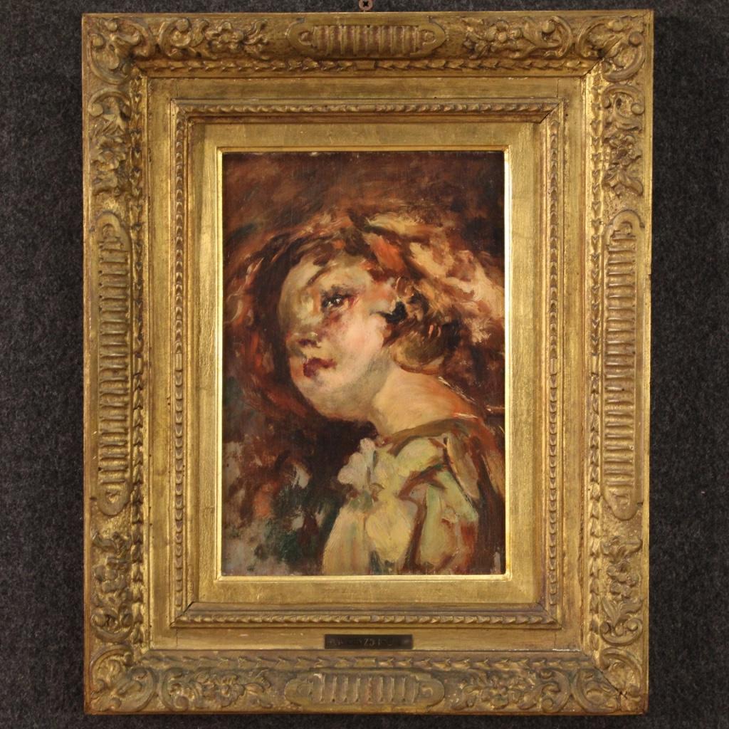Italian painting from the first half of the 20th century. Framework oil on panel depicting a portrait of a girl of good pictorial quality. Painting showing on the back of the panel and on the plate applied on the front a reference to Vincenzo Irolli