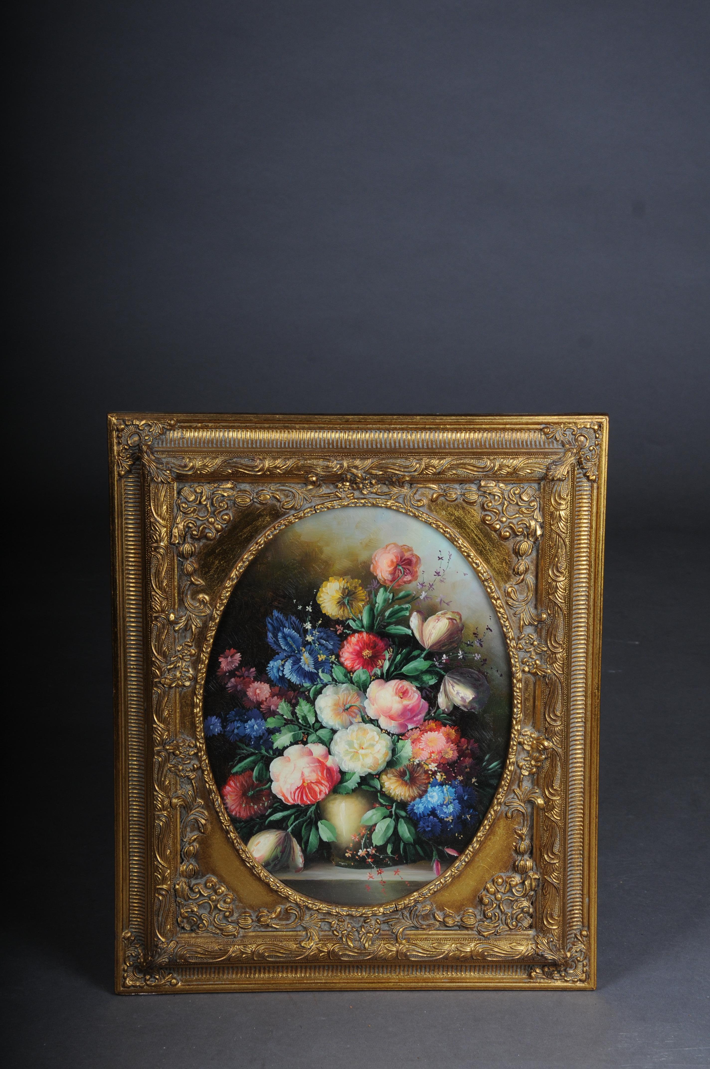 20th Century Oil Painting Still Life

Oil on panel still life, richly painted with lavish and luxuriant flowers.

Painting framed in an oval ornate and gilded wooden frame. Very decorative.