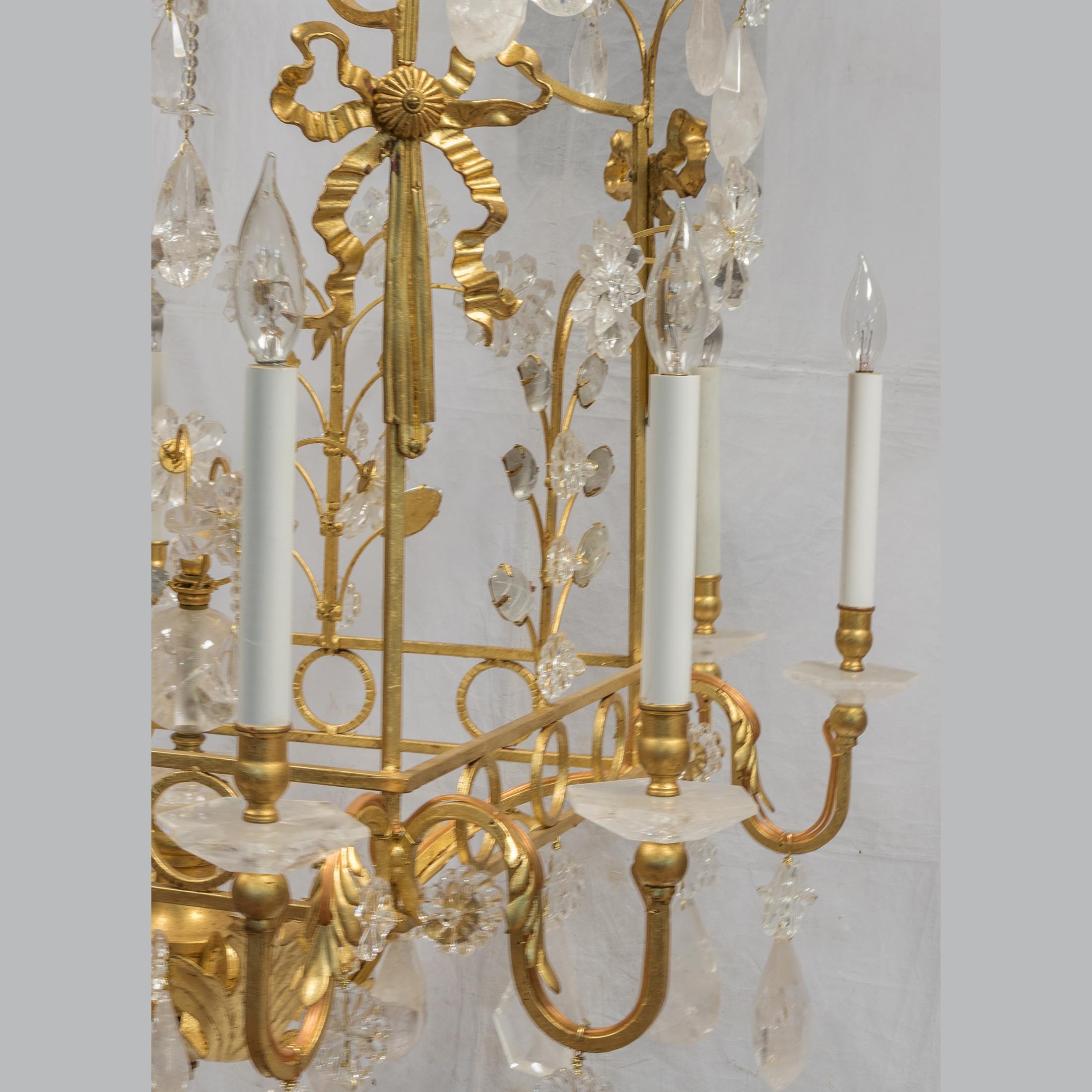 Rococo 20th Century Opulent Rock Crystal Chandelier with foliage and ribbon motif For Sale