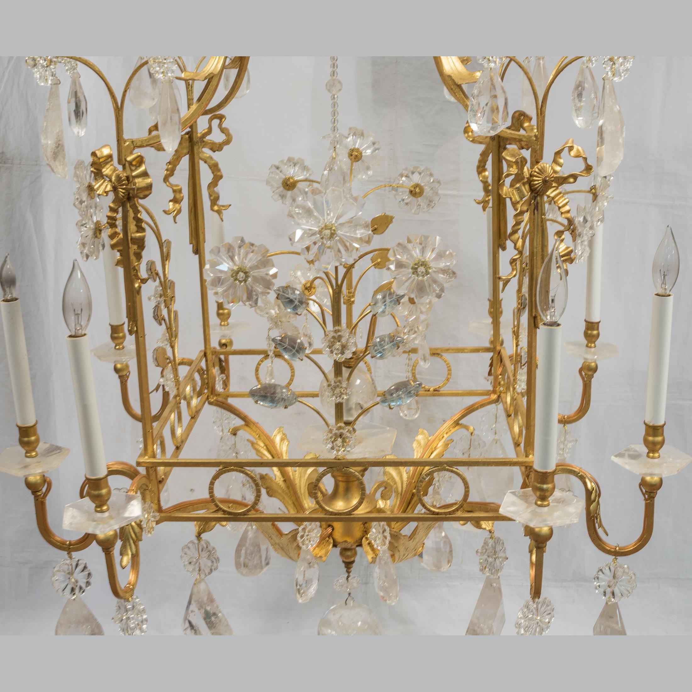 French 20th Century Opulent Rock Crystal Chandelier with foliage and ribbon motif For Sale
